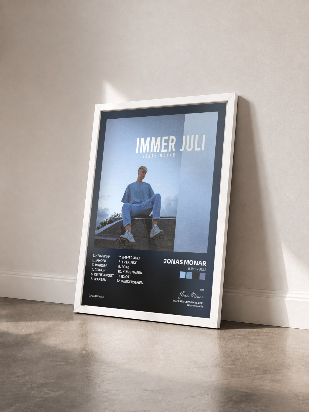 #blanc Tableau de l'album Immer Juli de Jonas Monar vu de trois quarts, cadre blanc