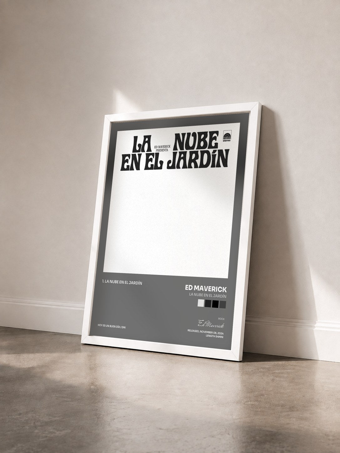 #blanc Tableau de l'album LA NUBE EN EL JARDÍN de Ed Maverick vu de trois quarts, cadre blanc