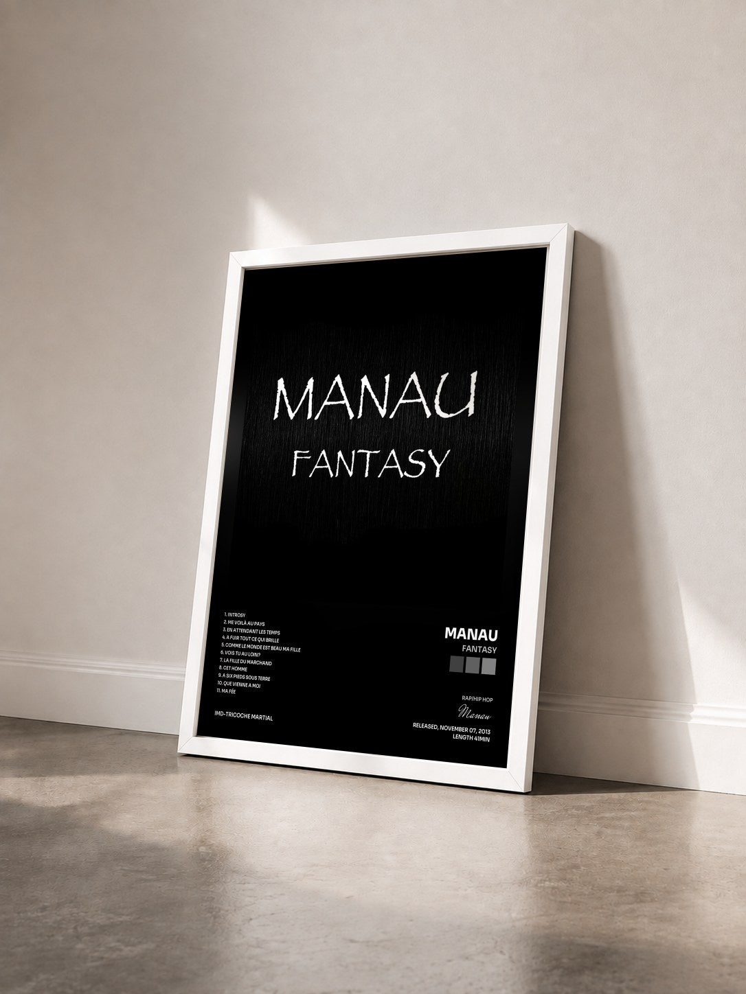 #blanc Tableau de l'album Fantasy de Manau vu de trois quarts, cadre blanc