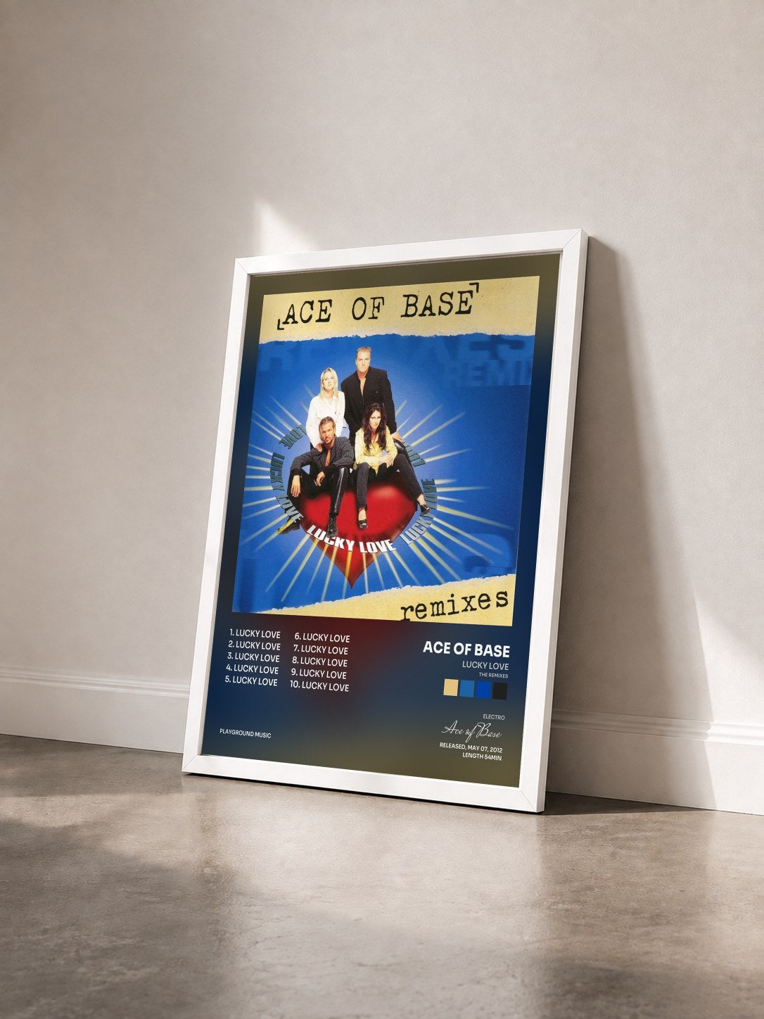 #blanc Tableau de l'album Lucky Love (The Remixes) de Ace of Base vu de trois quarts, cadre blanc