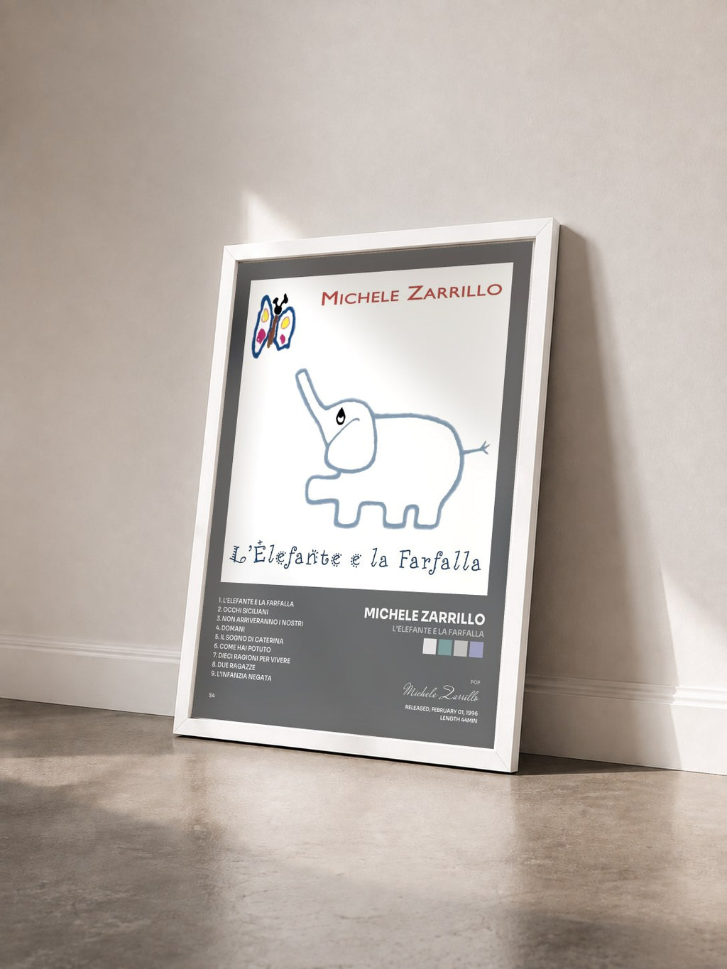 #blanc Tableau de l'album L'Elefante E La Farfalla de Michele Zarrillo vu de trois quarts, cadre blanc