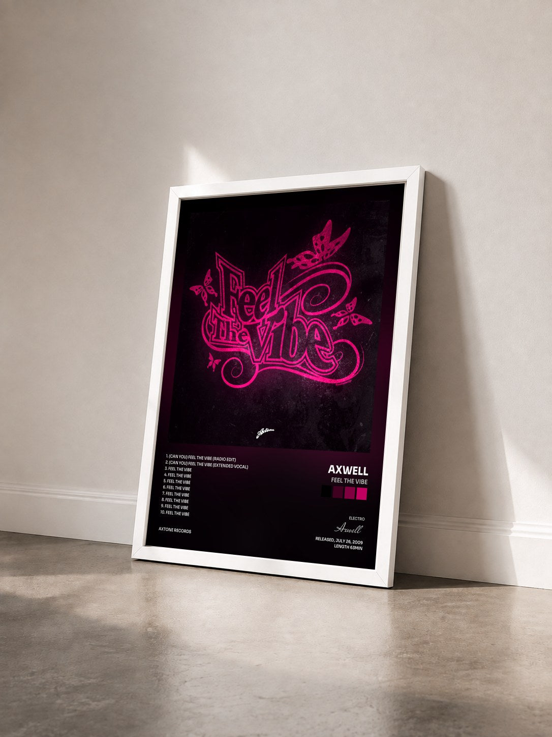 #blanc Tableau de l'album Feel The Vibe de Axwell vu de trois quarts, cadre blanc