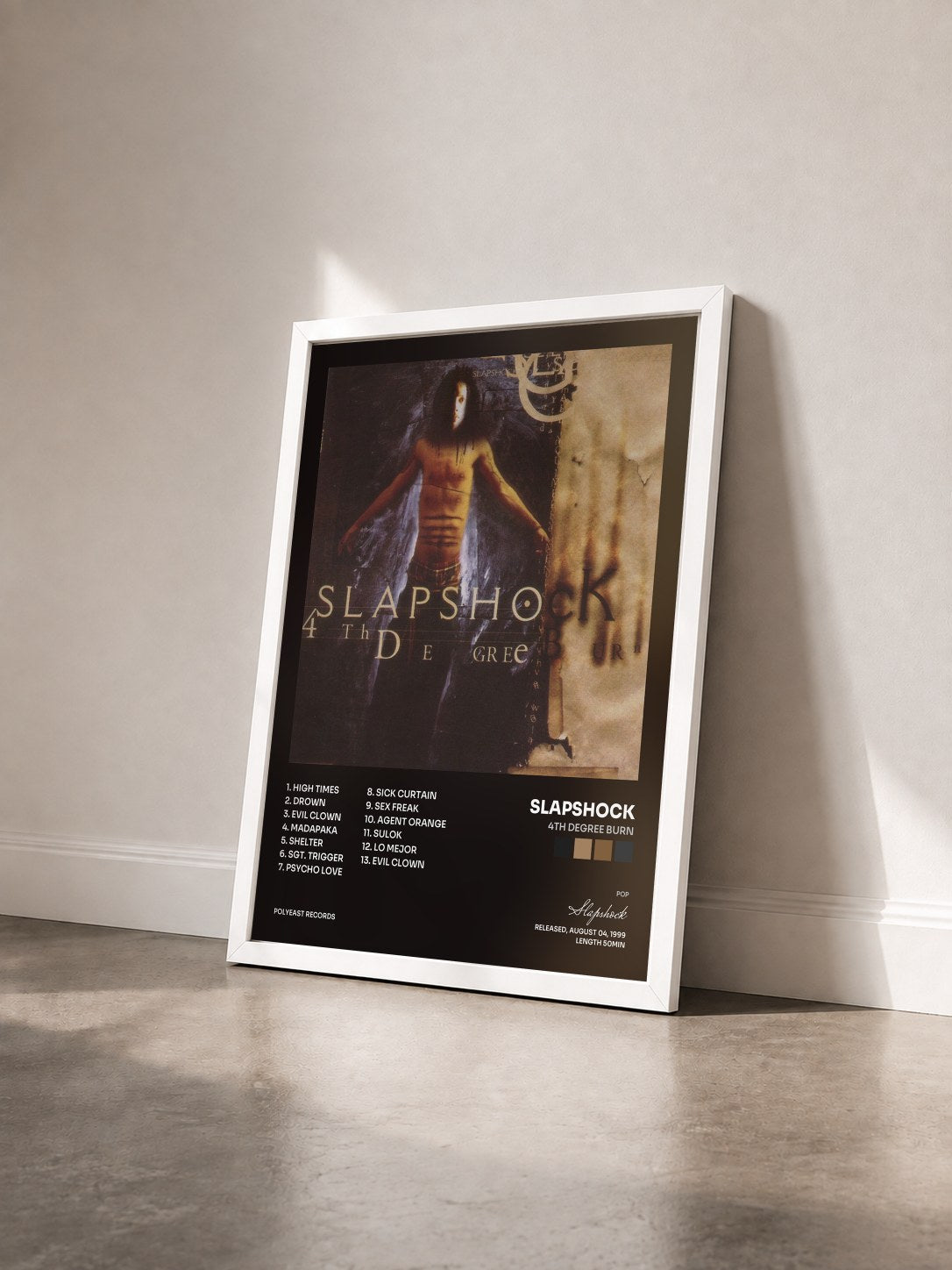#blanc Tableau de l'album 4th Degree Burn de Slapshock vu de trois quarts, cadre blanc