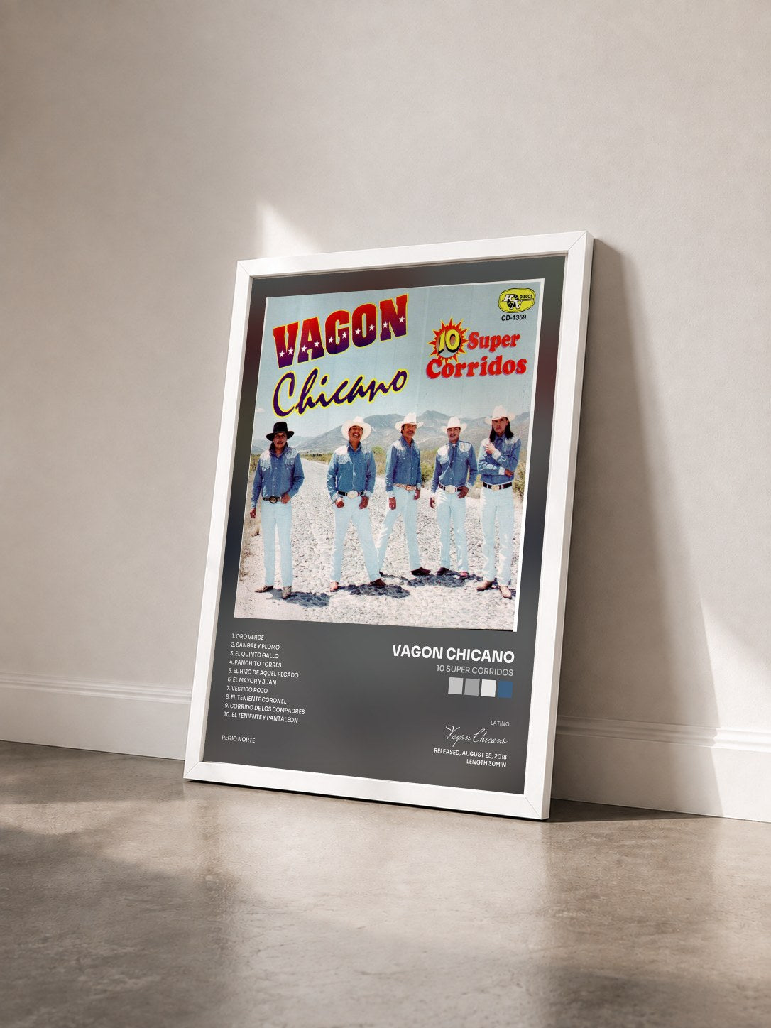 #blanc Tableau de l'album 10 Super Corridos de Vagon Chicano vu de trois quarts, cadre blanc