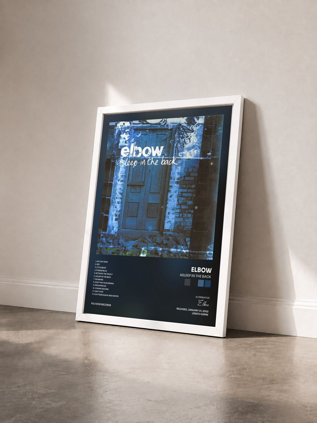 #blanc Tableau de l'album Asleep In The Back de Elbow vu de trois quarts, cadre blanc