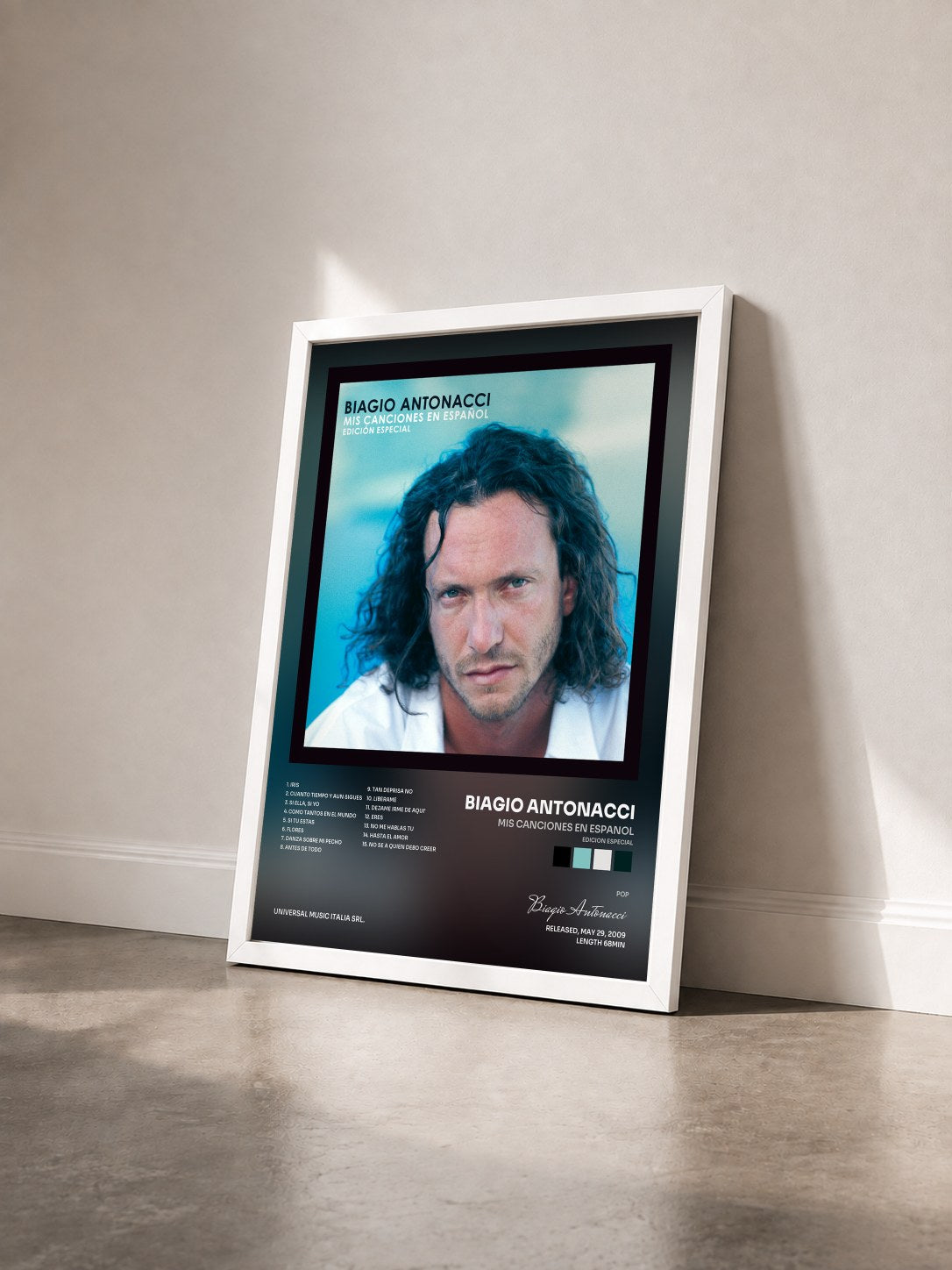 #blanc Tableau de l'album Mis Canciones En Espanol (Edicion Especial) de Biagio Antonacci vu de trois quarts, cadre blanc