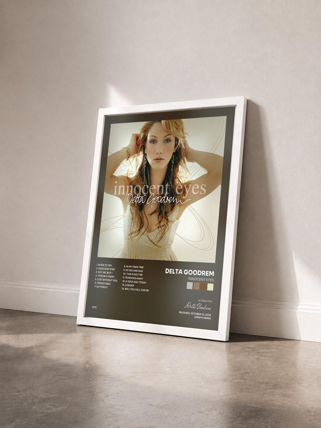 #blanc Tableau de l'album Innocent Eyes de Delta Goodrem vu de trois quarts, cadre blanc