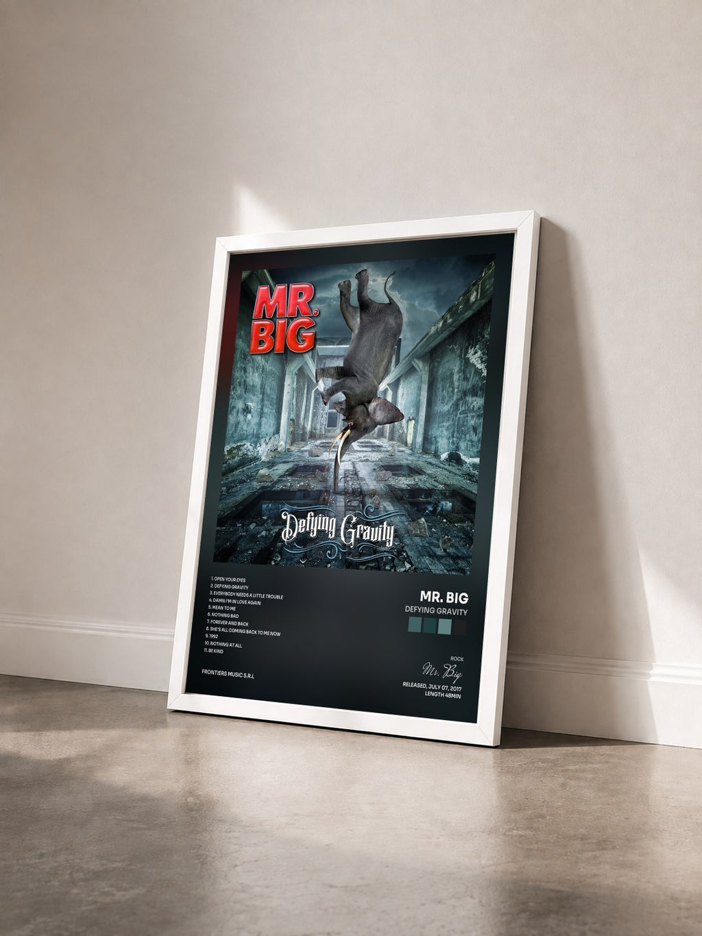 #blanc Tableau de l'album Defying Gravity de Mr. Big vu de trois quarts, cadre blanc
