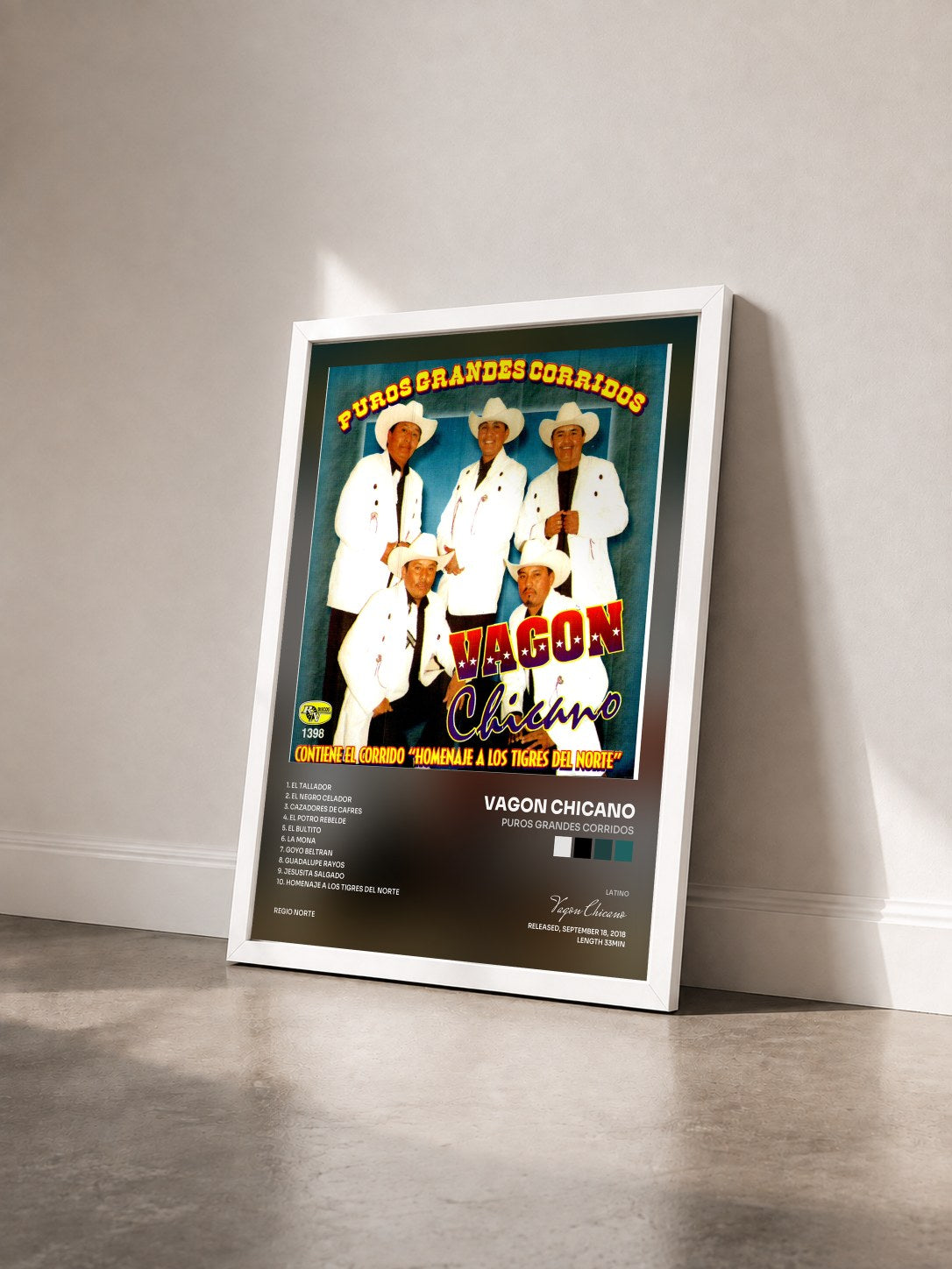 #blanc Tableau de l'album Puros Grandes Corridos de Vagon Chicano vu de trois quarts, cadre blanc