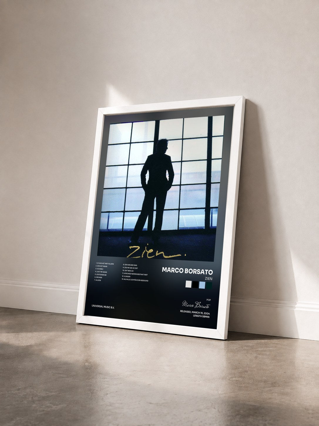 #blanc Tableau de l'album Zien de Marco Borsato vu de trois quarts, cadre blanc