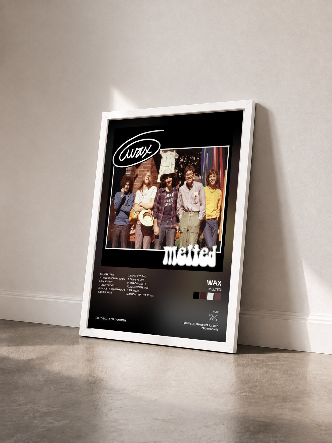 #blanc Tableau de l'album Melted de Wax vu de trois quarts, cadre blanc