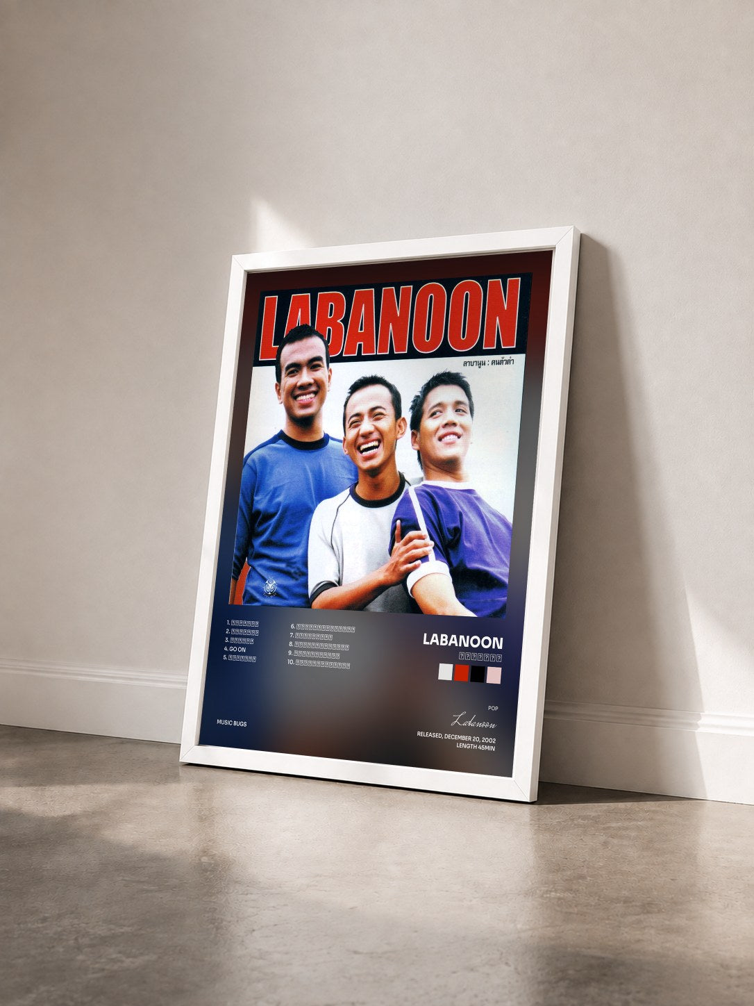 #blanc Tableau de l'album คนตัวดำ de Labanoon vu de trois quarts, cadre blanc