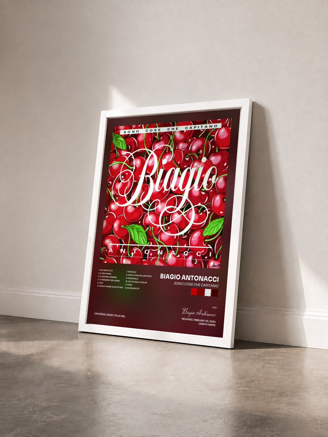 #blanc Tableau de l'album Sono Cose Che Capitano de Biagio Antonacci vu de trois quarts, cadre blanc