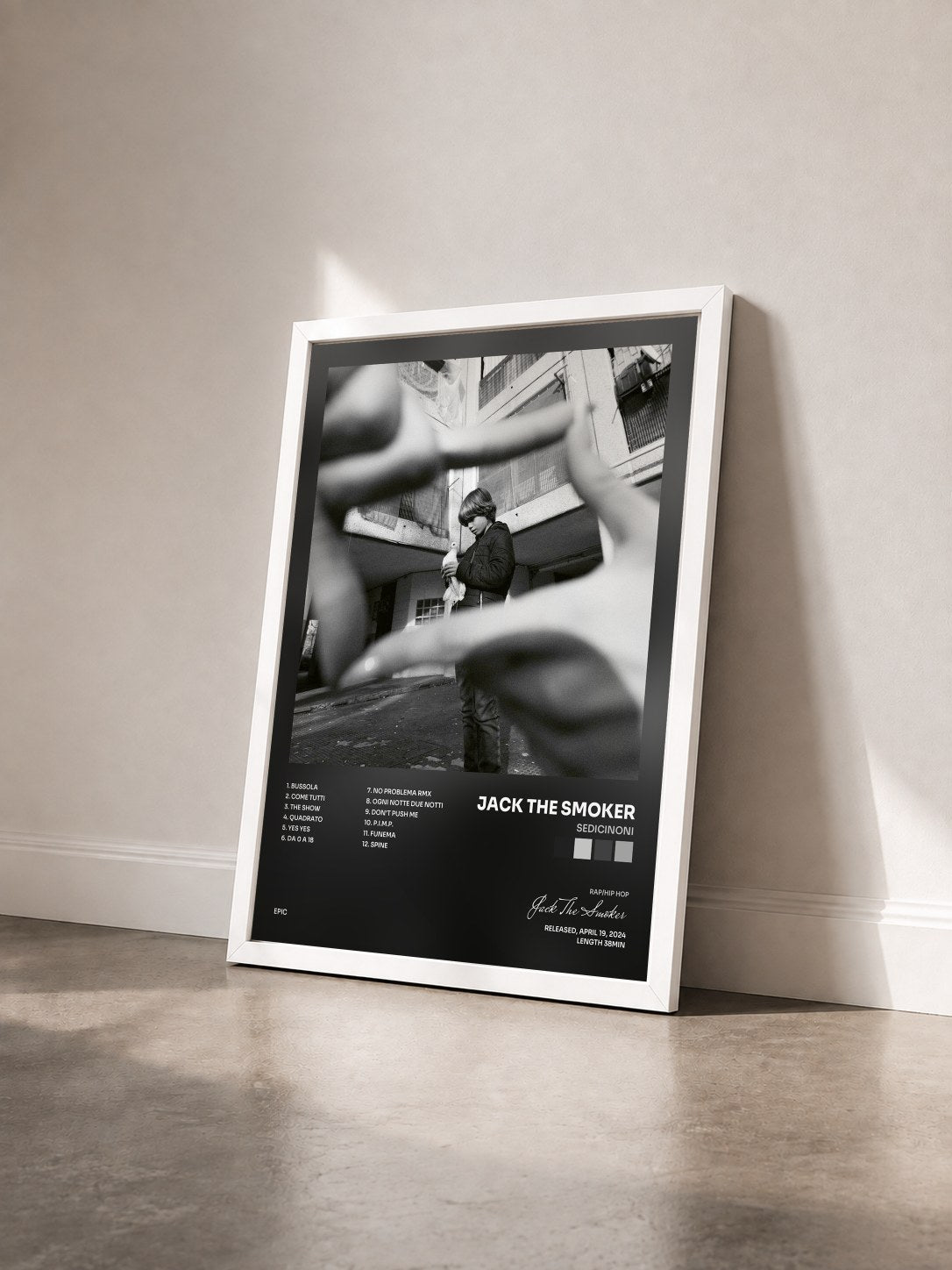 #blanc Tableau de l'album Sedicinoni de Jack The Smoker vu de trois quarts, cadre blanc