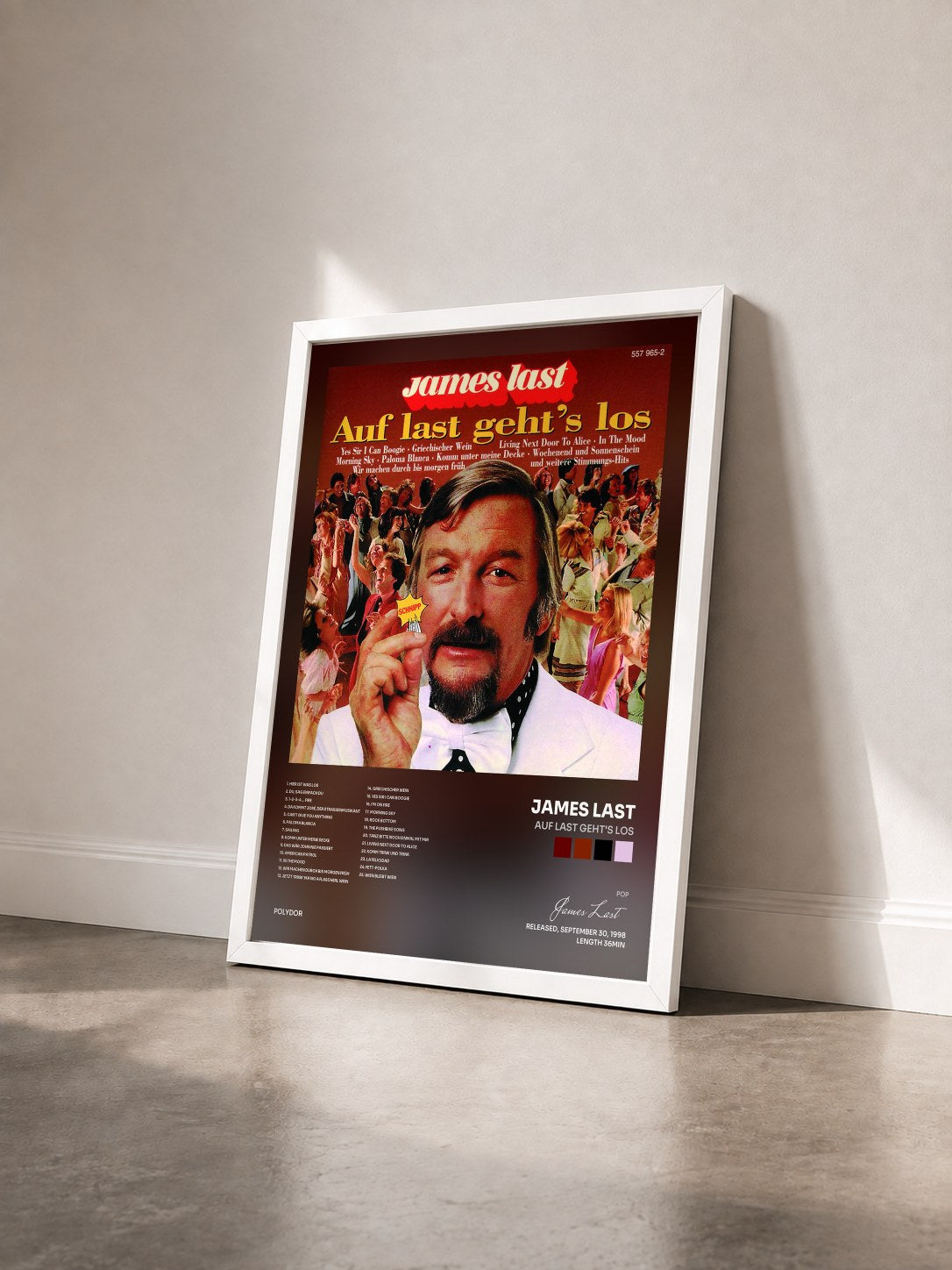 #blanc Tableau de l'album Auf Last Geht's Los de James Last vu de trois quarts, cadre blanc