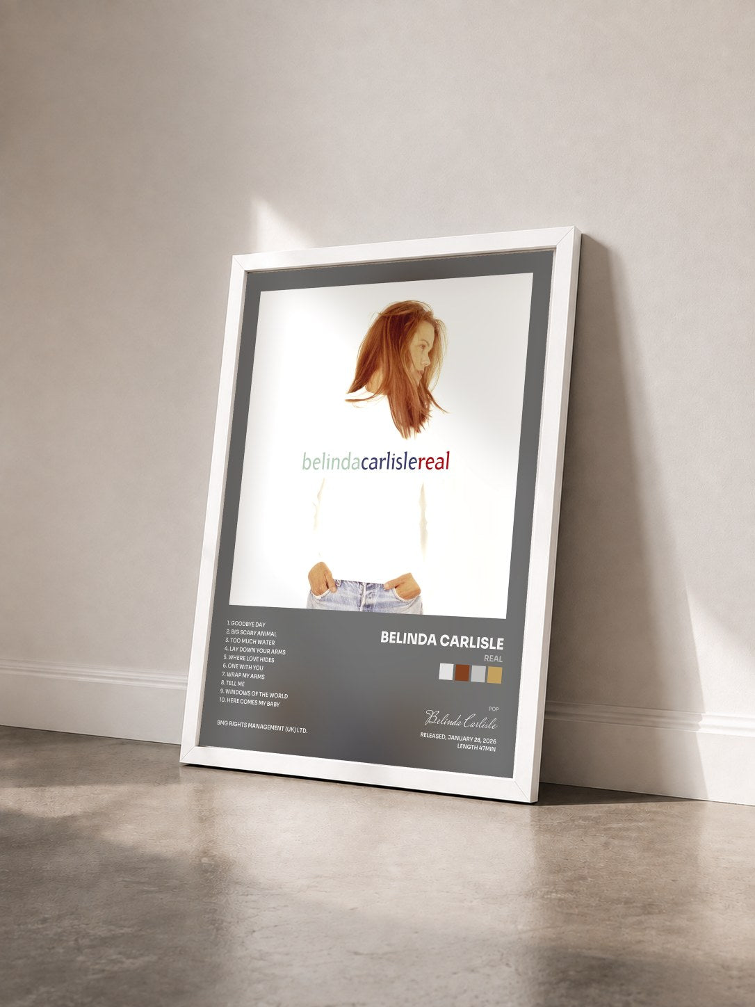 #blanc Tableau de l'album Real de Belinda Carlisle vu de trois quarts, cadre blanc