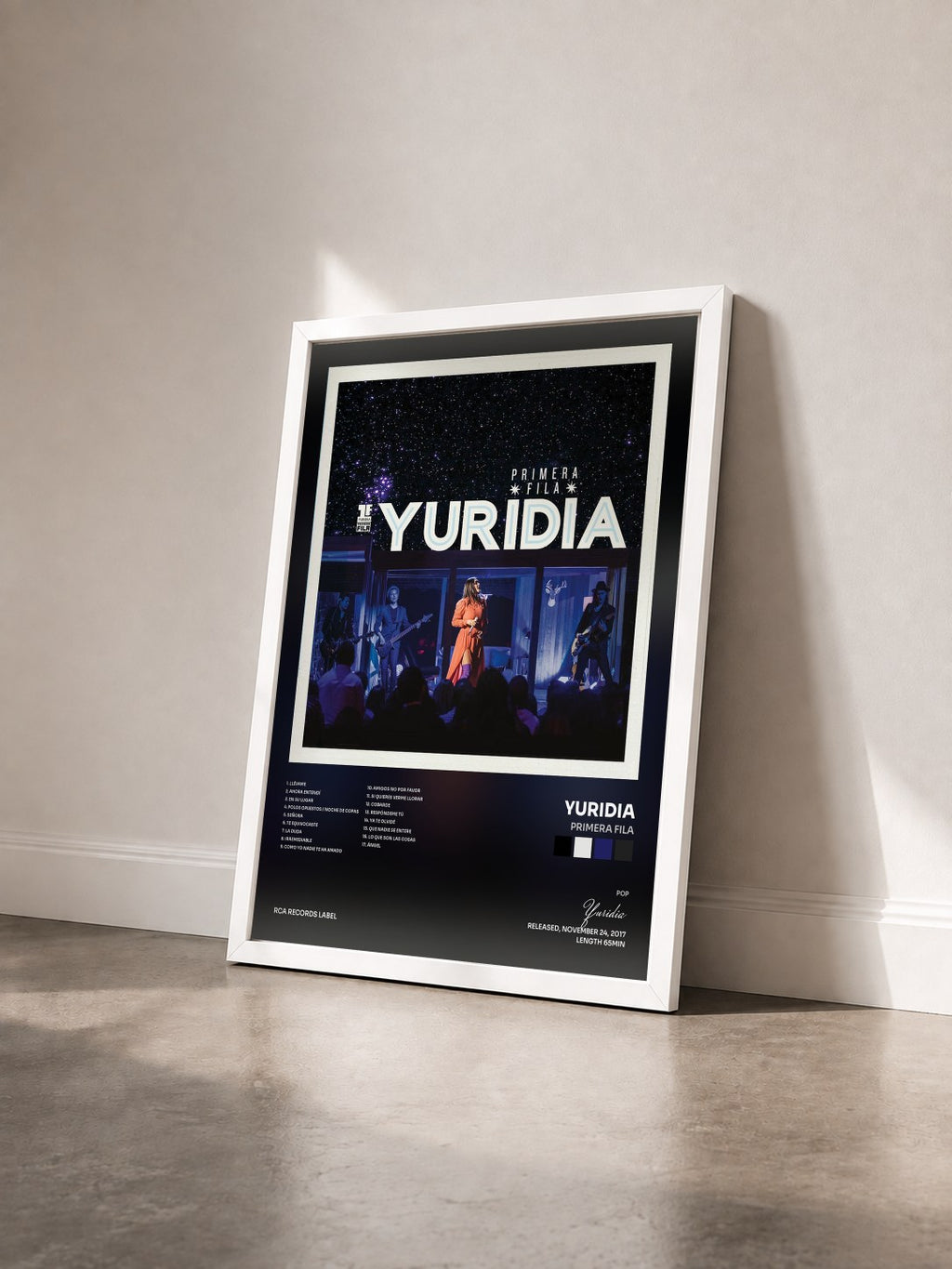 #blanc Tableau de l'album Primera Fila de Yuridia vu de trois quarts, cadre blanc