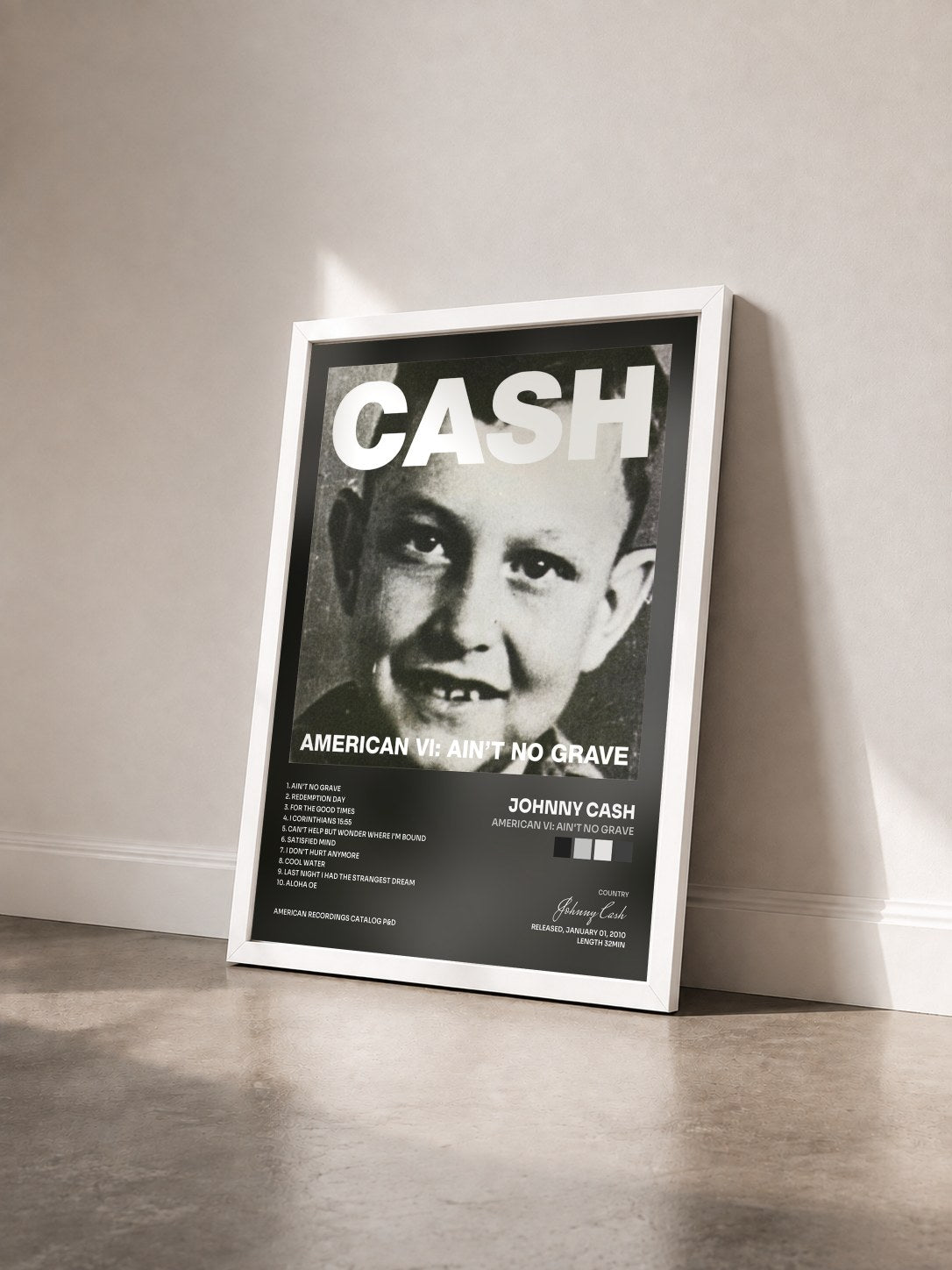 #blanc Tableau de l'album American VI: Ain't No Grave de Johnny Cash vu de trois quarts, cadre blanc