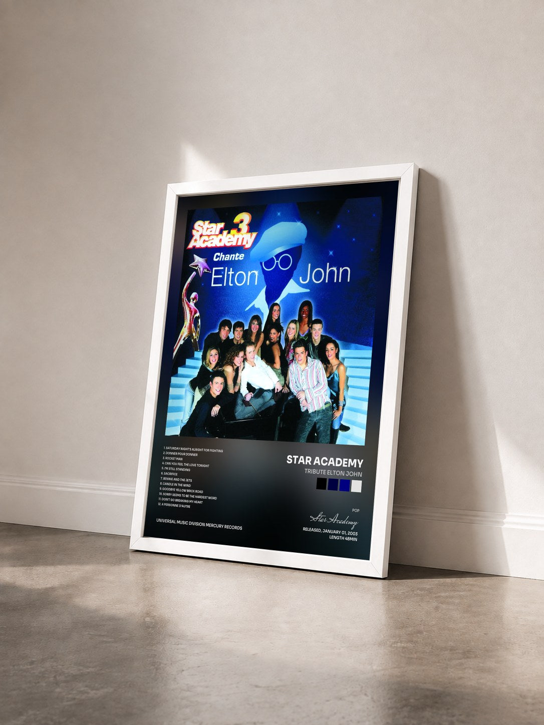 #blanc Tableau de l'album Tribute Elton John de Star Academy vu de trois quarts, cadre blanc