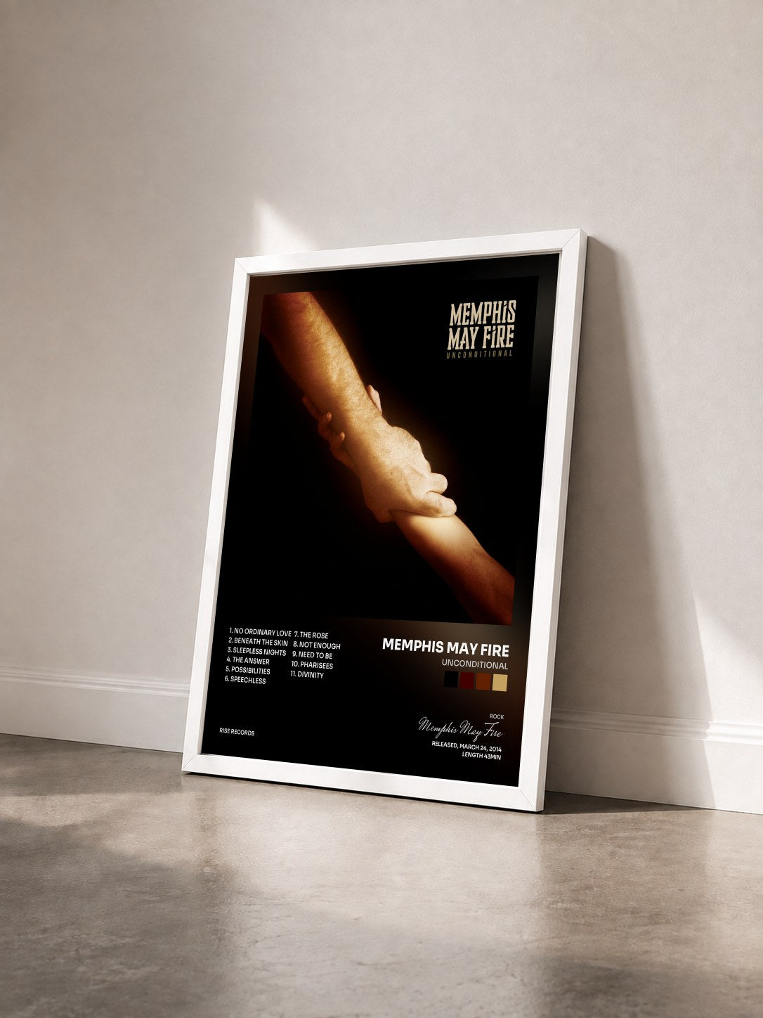 #blanc Tableau de l'album Unconditional de Memphis May Fire vu de trois quarts, cadre blanc