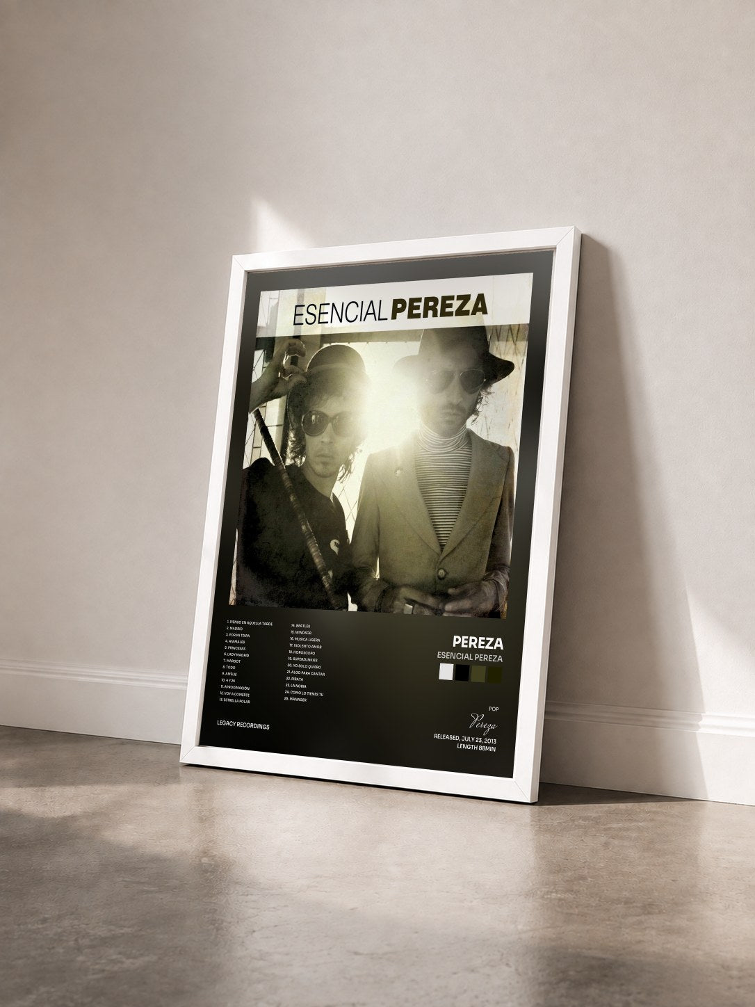 #blanc Tableau de l'album Esencial Pereza de Pereza vu de trois quarts, cadre blanc
