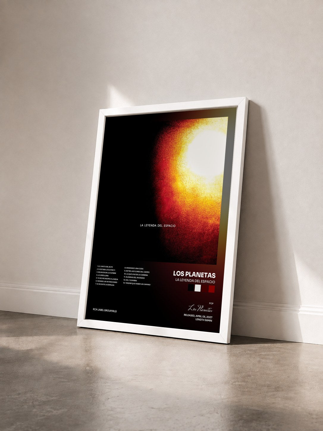 #blanc Tableau de l'album La Leyenda Del Espacio de Los Planetas vu de trois quarts, cadre blanc