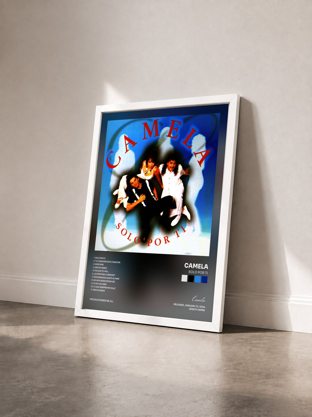 #blanc Tableau de l'album Solo por Ti de Camela vu de trois quarts, cadre blanc