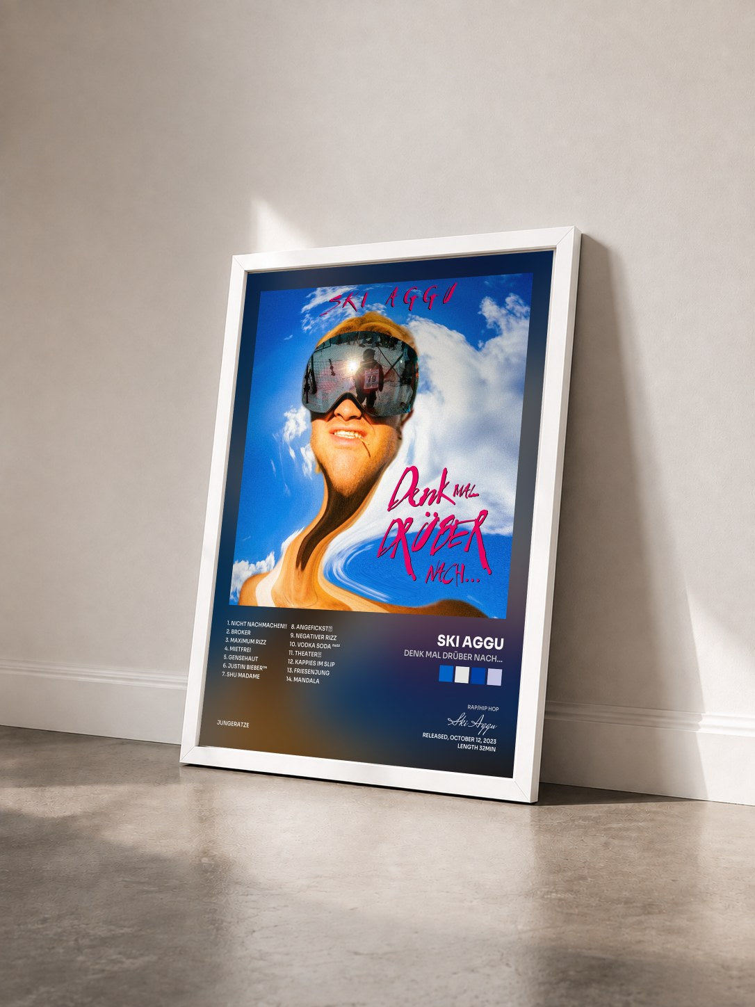 #blanc Tableau de l'album denk mal drüber nach... de Ski Aggu vu de trois quarts, cadre blanc
