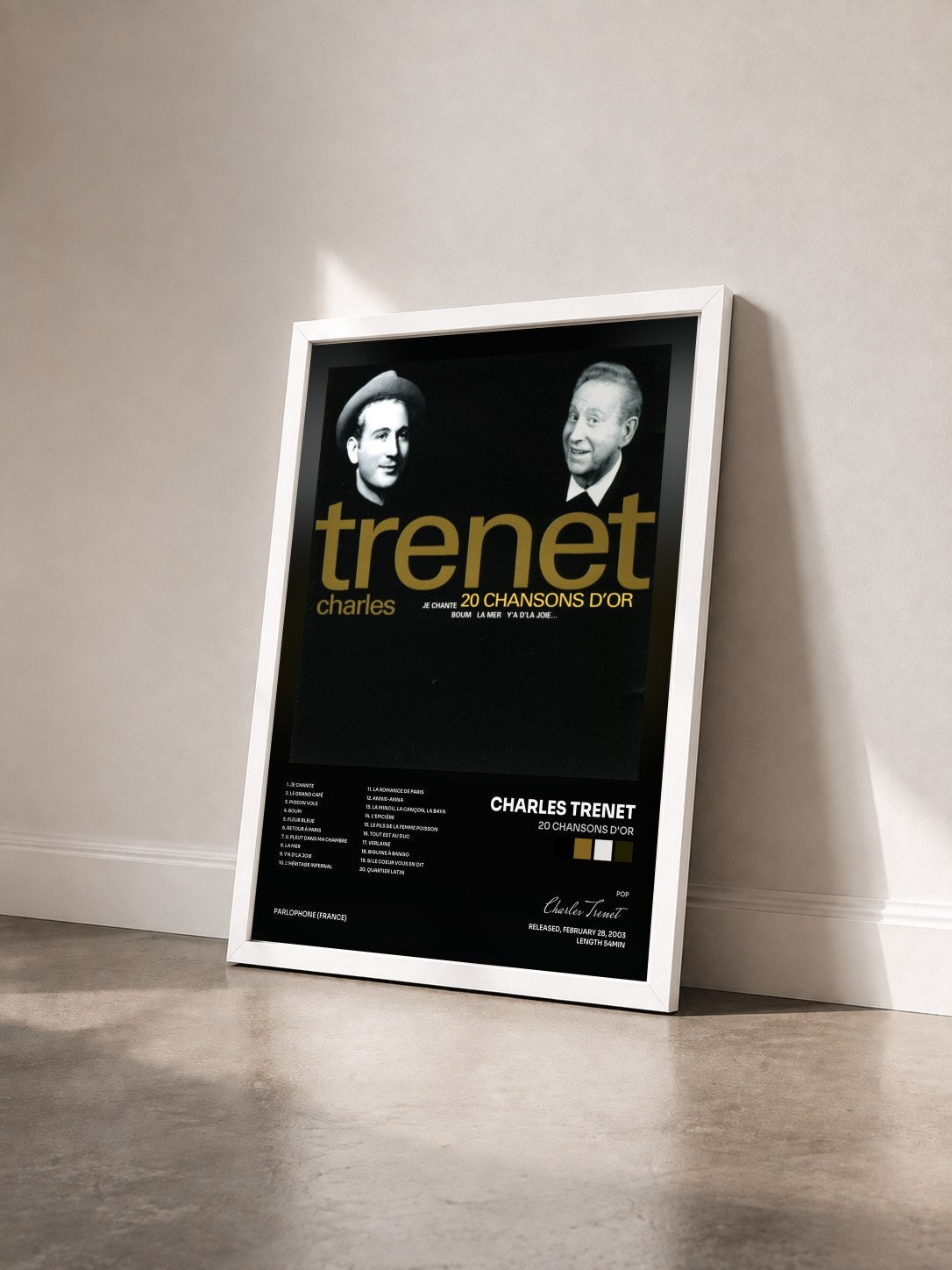 #blanc Tableau de l'album 20 chansons d'or de Charles Trenet vu de trois quarts, cadre blanc