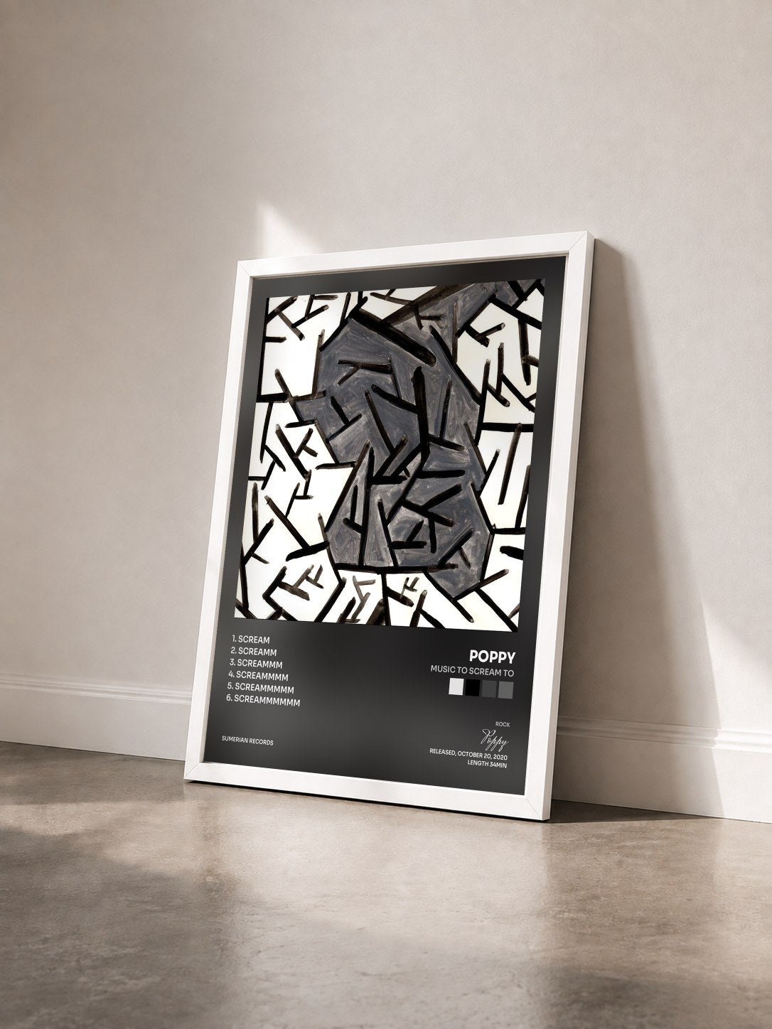 #blanc Tableau de l'album Music To Scream To de Poppy vu de trois quarts, cadre blanc