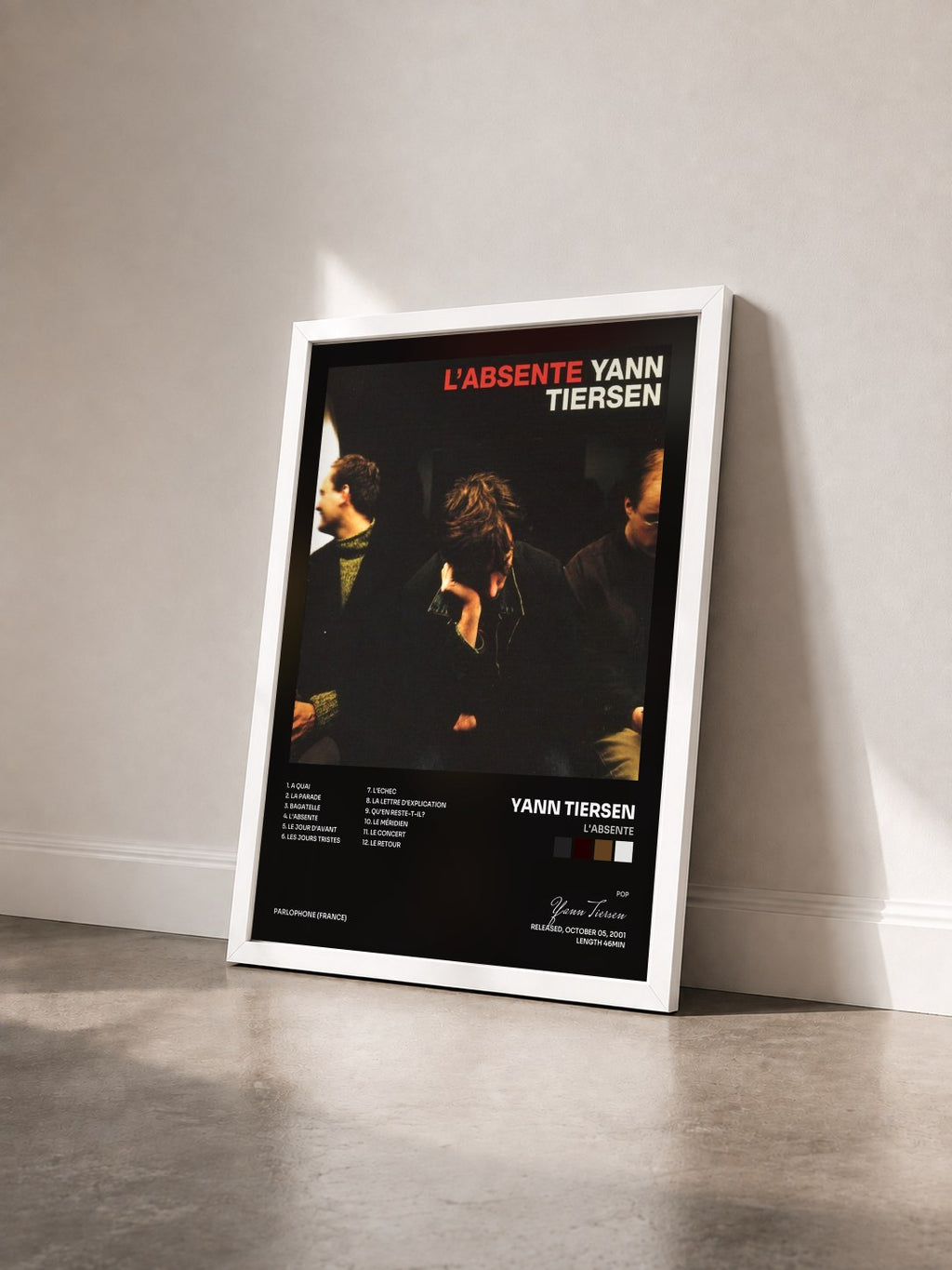 #blanc Tableau de l'album L'absente de Yann Tiersen vu de trois quarts, cadre blanc