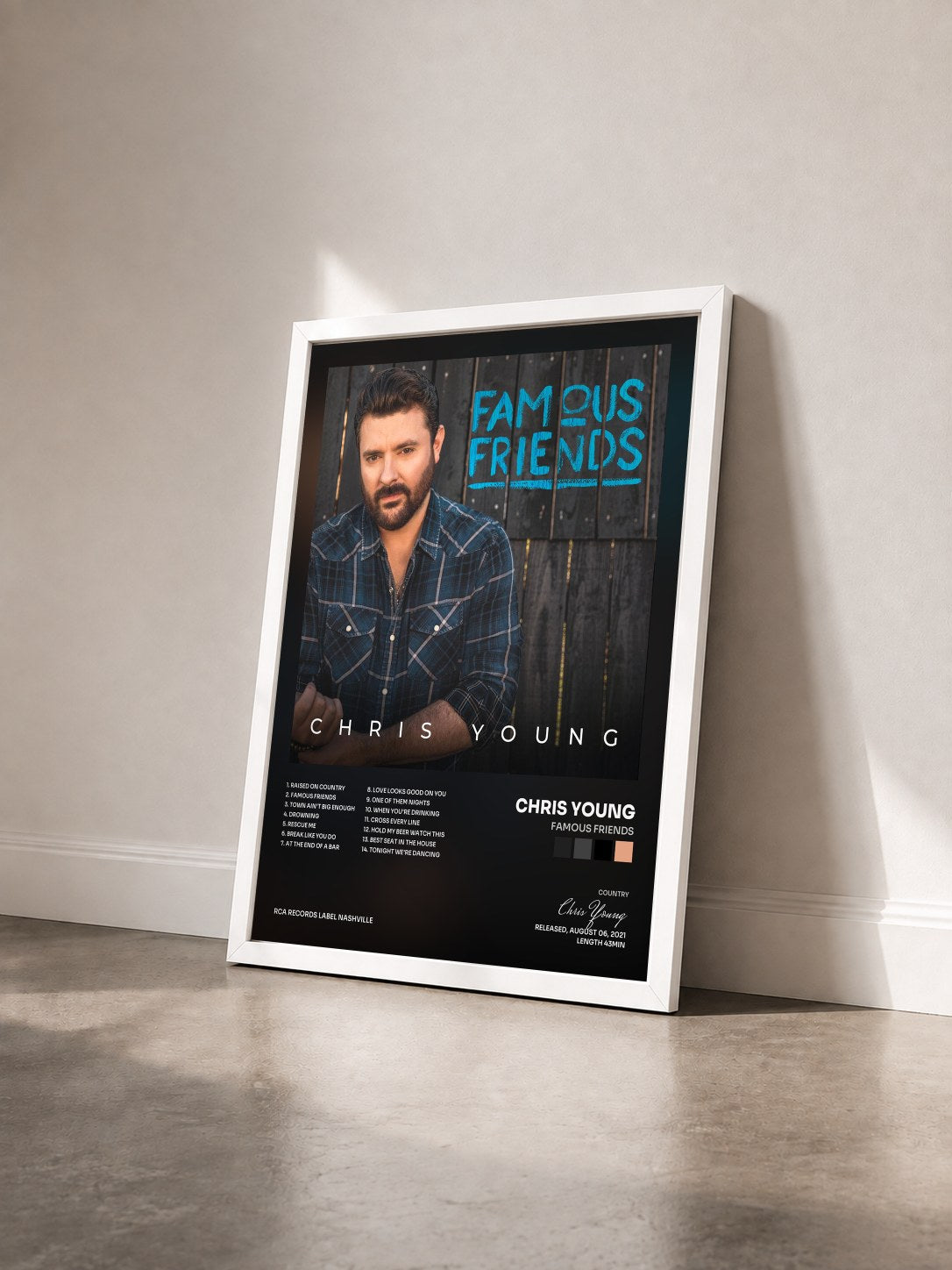 #blanc Tableau de l'album Famous Friends de Chris Young vu de trois quarts, cadre blanc