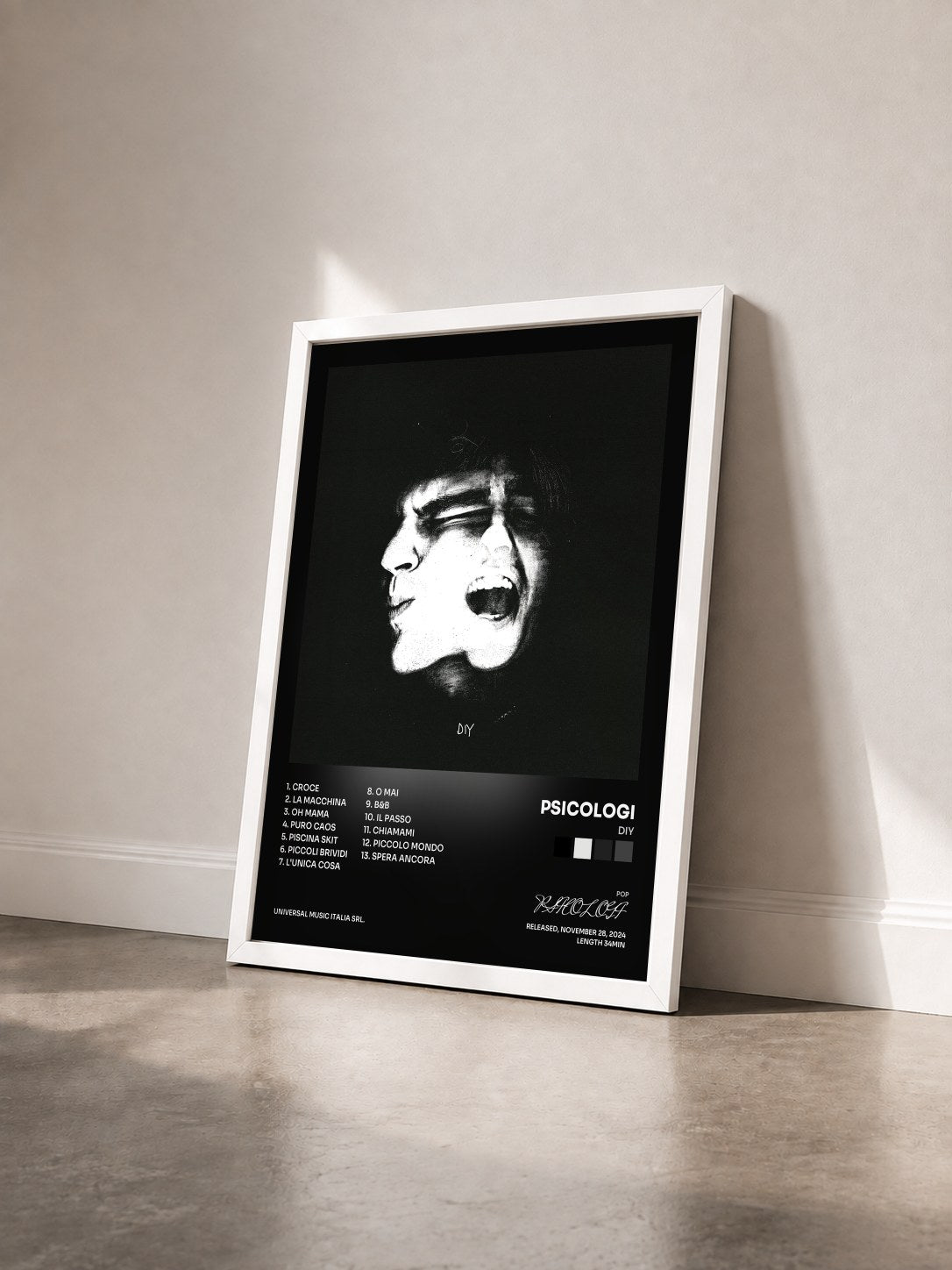 #blanc Tableau de l'album DIY de PSICOLOGI vu de trois quarts, cadre blanc