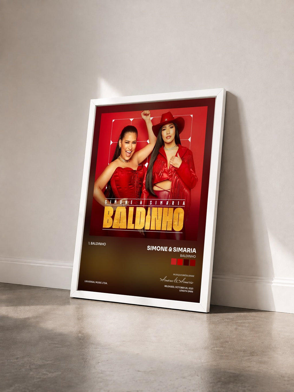 #blanc Tableau de l'album Baldinho de Simone & Simaria vu de trois quarts, cadre blanc
