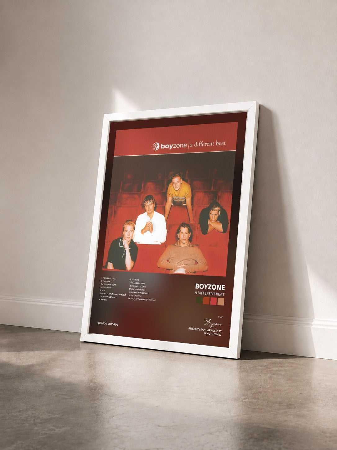 #blanc Tableau de l'album A Different Beat de Boyzone vu de trois quarts, cadre blanc
