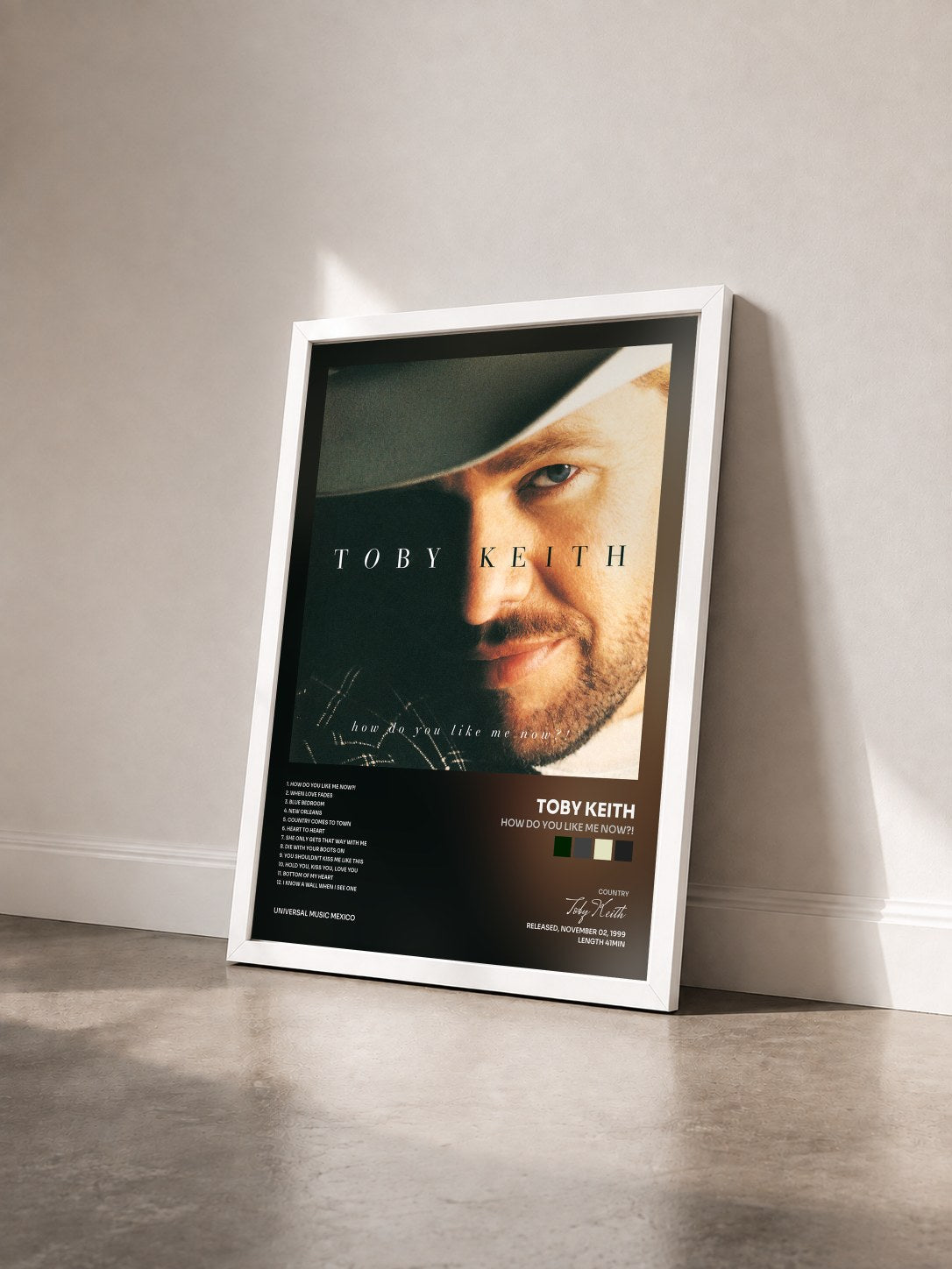 #blanc Tableau de l'album How Do You Like Me Now?! de Toby Keith vu de trois quarts, cadre blanc