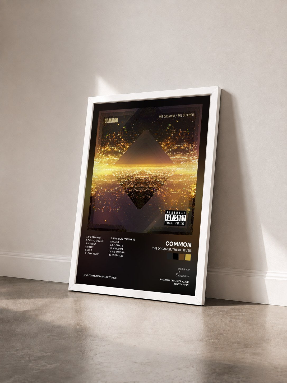 #blanc Tableau de l'album The Dreamer, The Believer de Common vu de trois quarts, cadre blanc