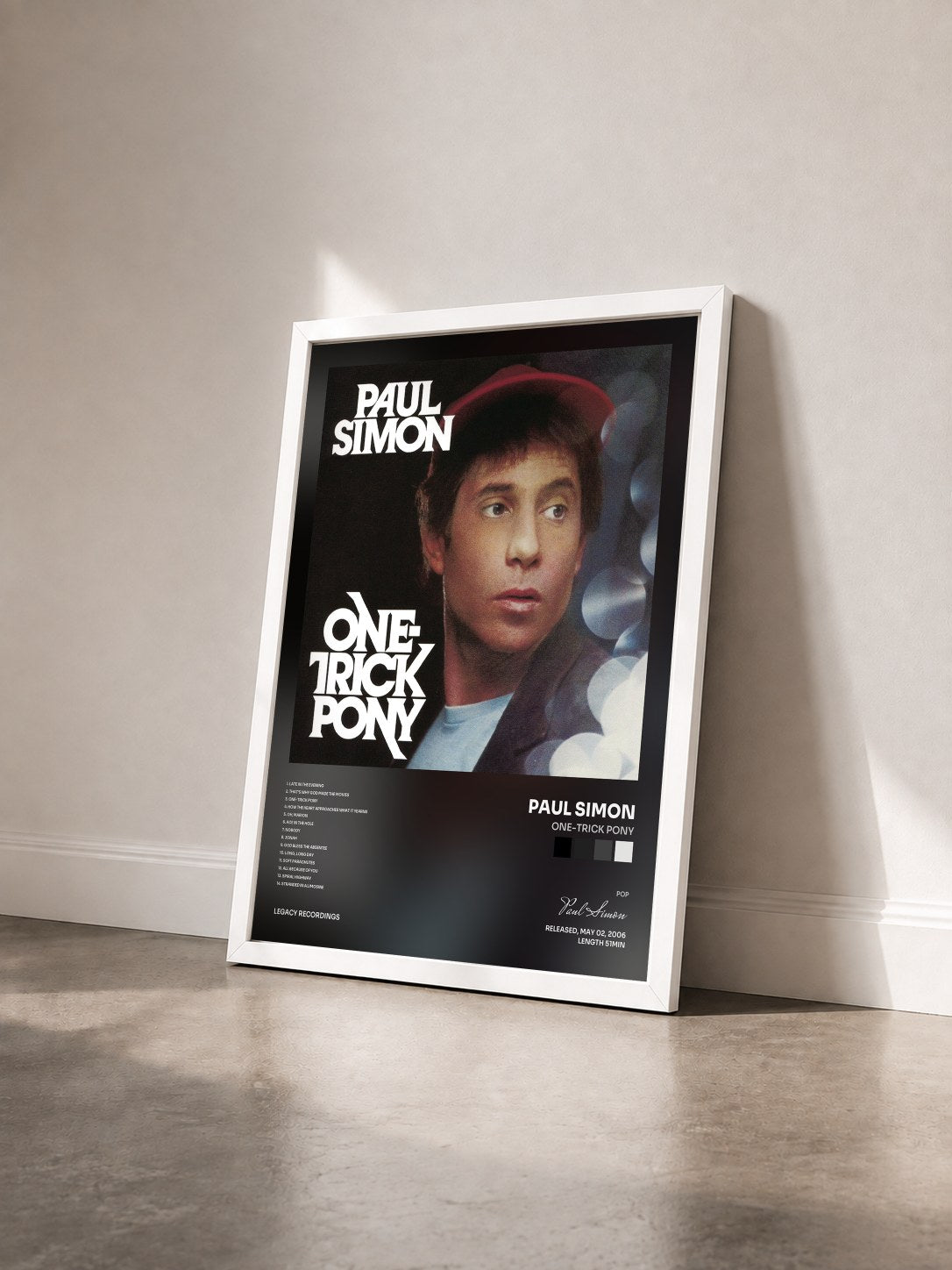#blanc Tableau de l'album One-Trick Pony de Paul Simon vu de trois quarts, cadre blanc