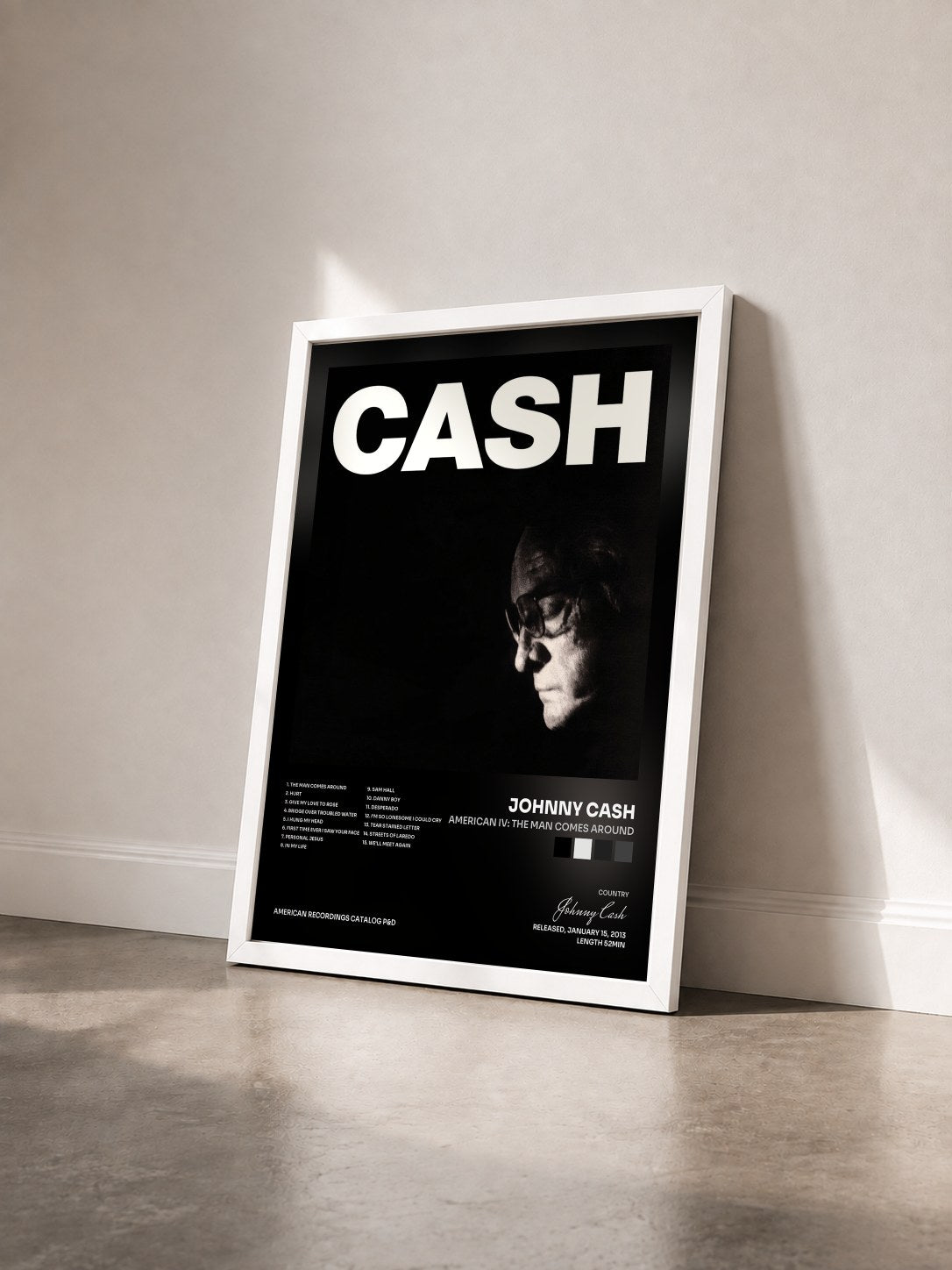 #blanc Tableau de l'album American IV: The Man Comes Around de Johnny Cash vu de trois quarts, cadre blanc
