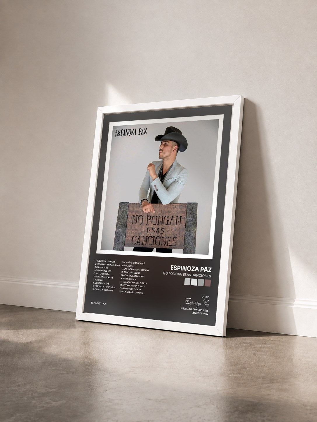 #blanc Tableau de l'album No Pongan Esas Canciones de Espinoza Paz vu de trois quarts, cadre blanc