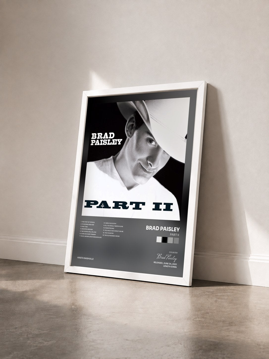 #blanc Tableau de l'album Part II de Brad Paisley vu de trois quarts, cadre blanc