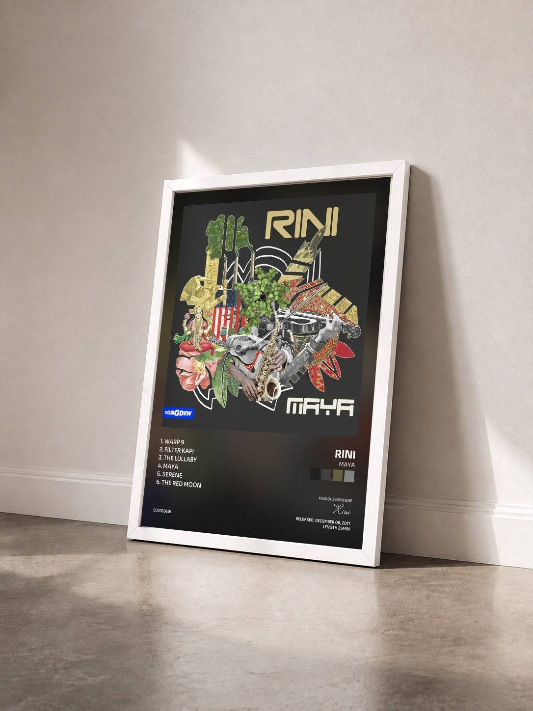 #blanc Tableau de l'album Maya de Rini vu de trois quarts, cadre blanc