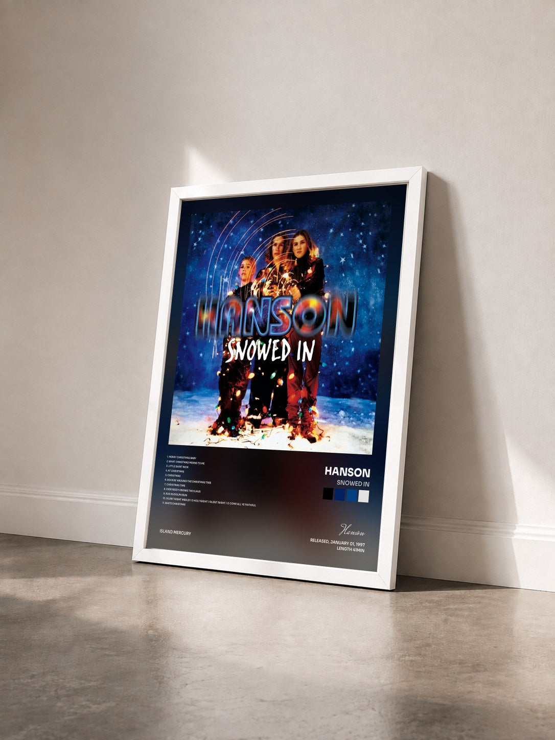 #blanc Tableau de l'album Snowed In de Hanson vu de trois quarts, cadre blanc