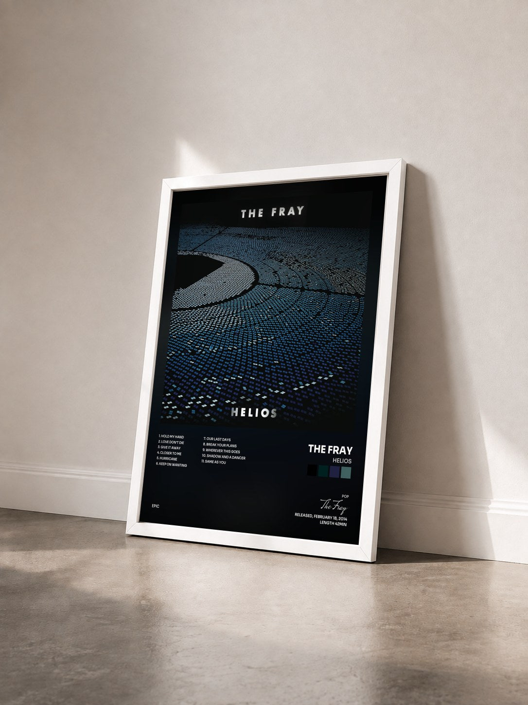 #blanc Tableau de l'album Helios de The Fray vu de trois quarts, cadre blanc