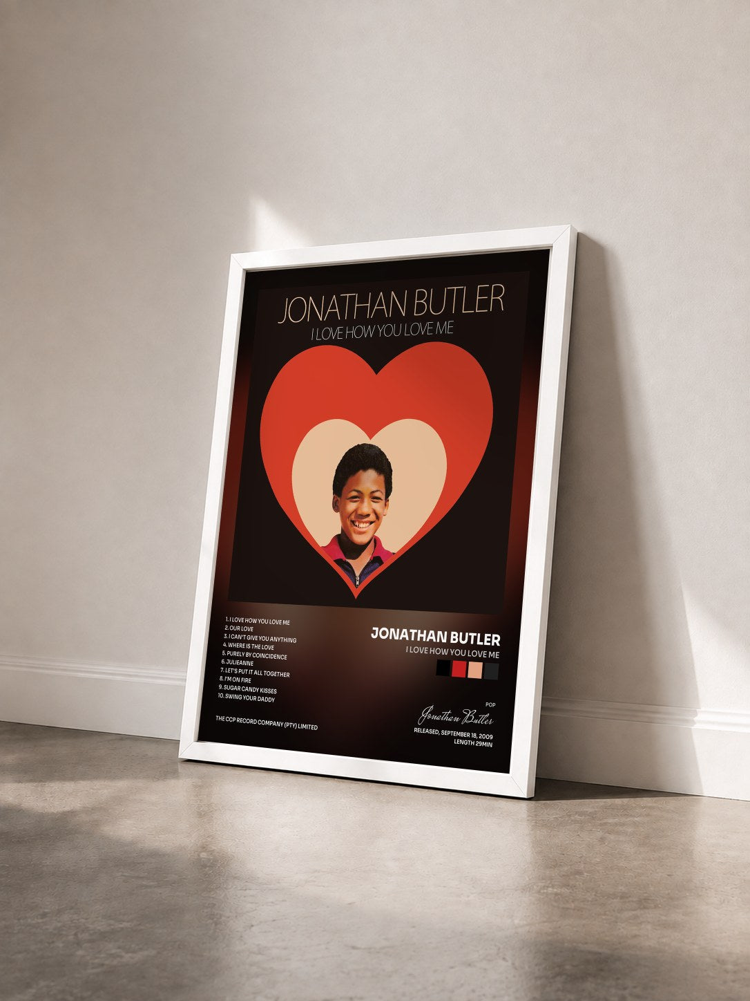 #blanc Tableau de l'album I Love How You Love Me de Jonathan Butler vu de trois quarts, cadre blanc