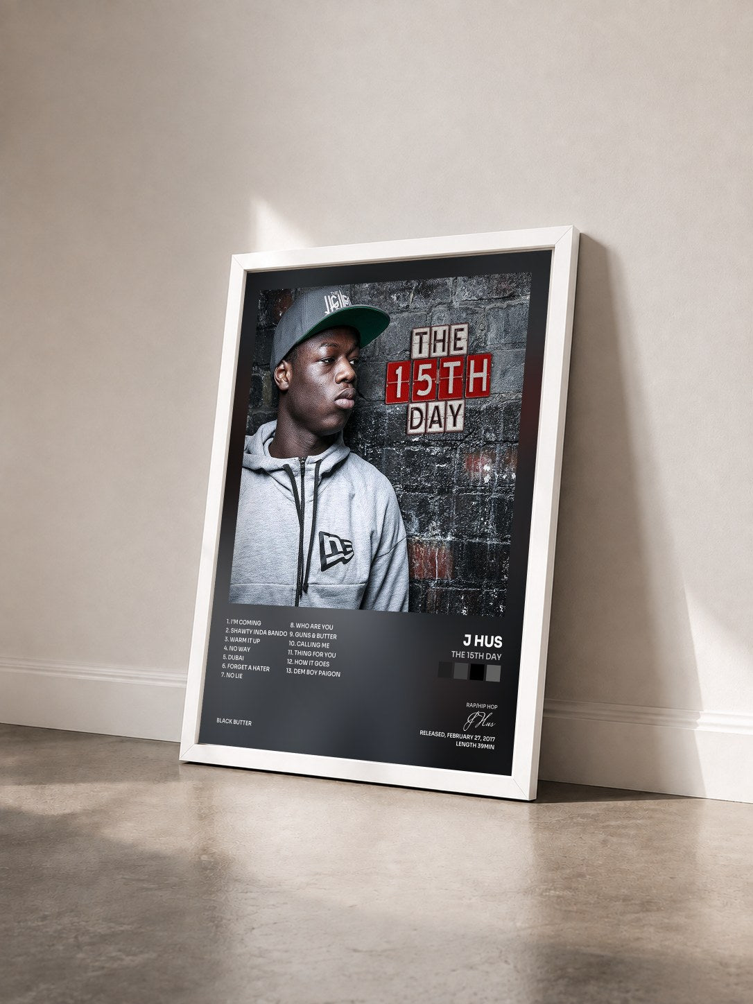 #blanc Tableau de l'album The 15th Day de J Hus vu de trois quarts, cadre blanc