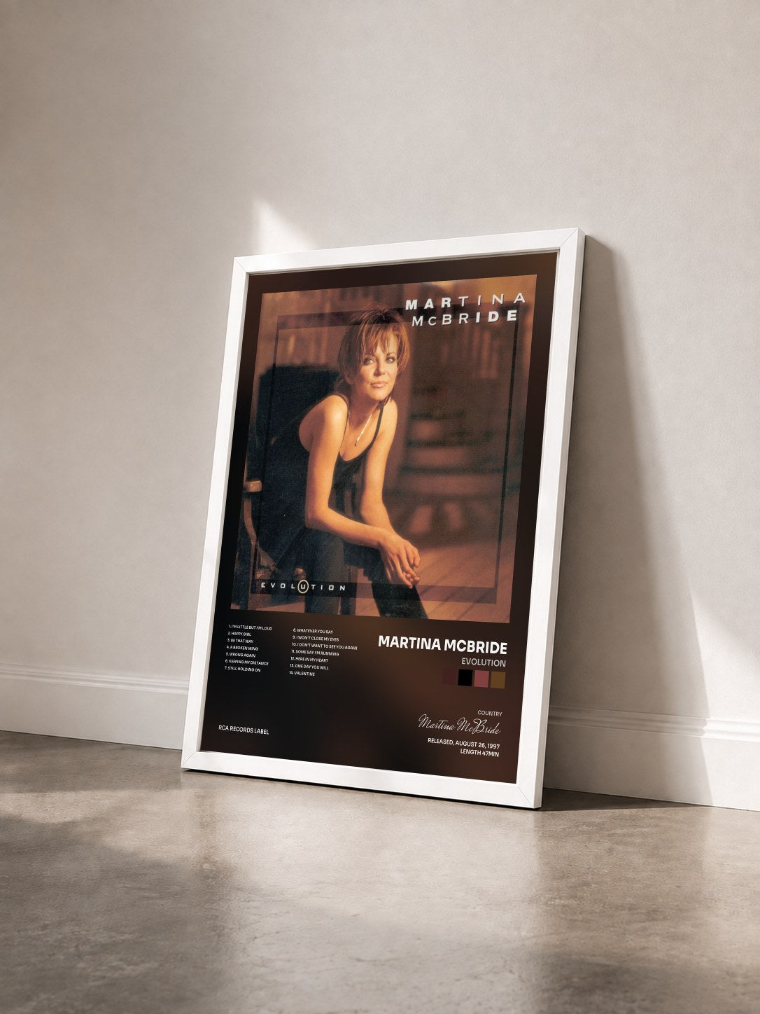 #blanc Tableau de l'album Evolution de Martina McBride vu de trois quarts, cadre blanc