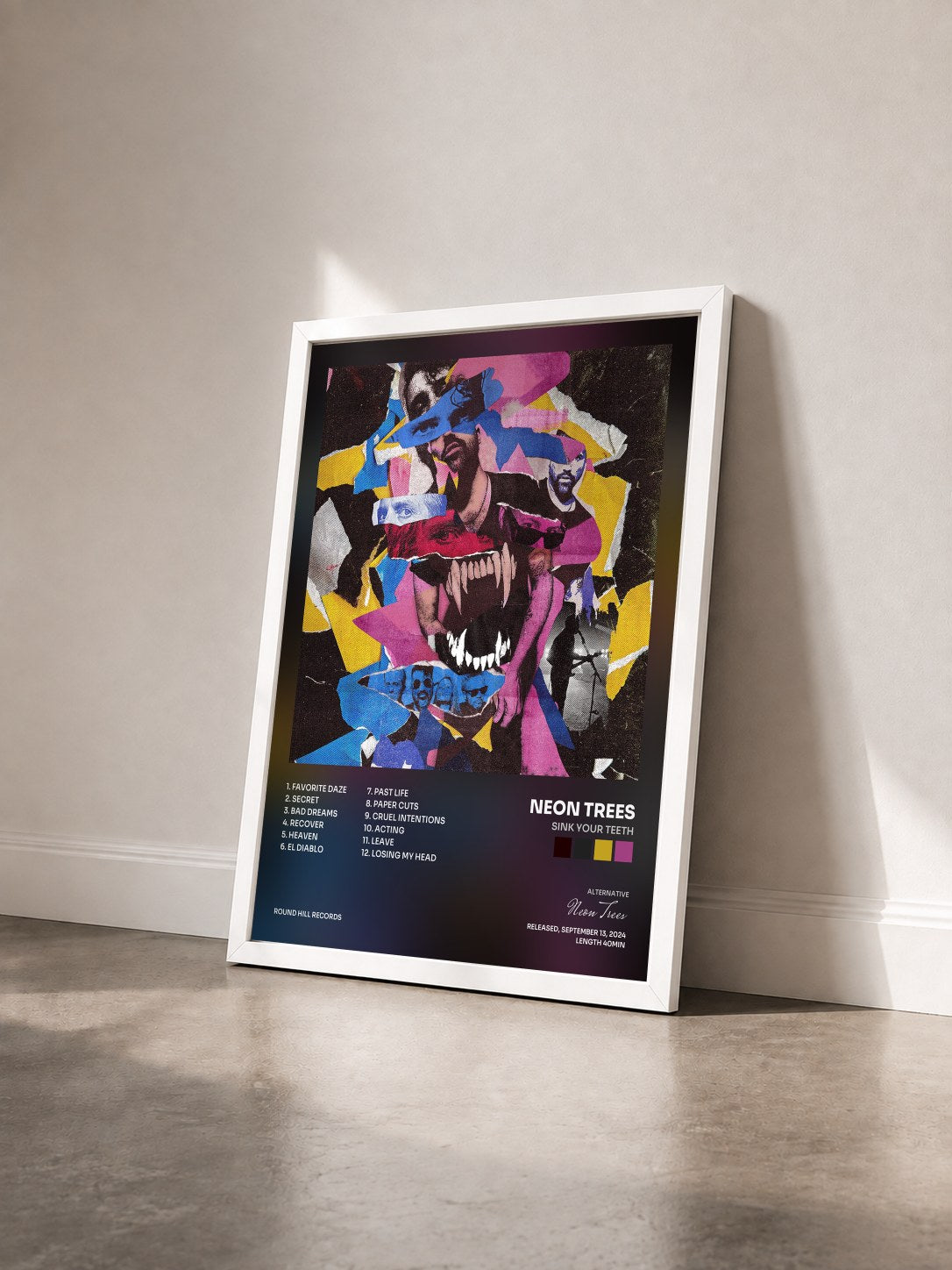 #blanc Tableau de l'album Sink Your Teeth de Neon Trees vu de trois quarts, cadre blanc
