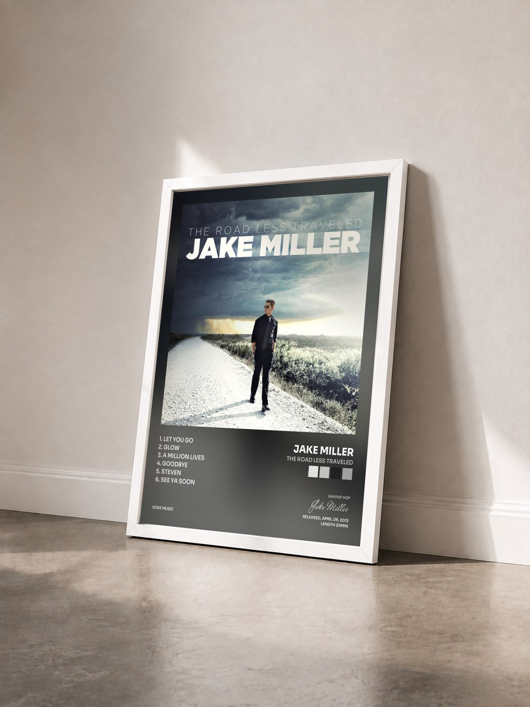 #blanc Tableau de l'album The Road Less Traveled de Jake Miller vu de trois quarts, cadre blanc