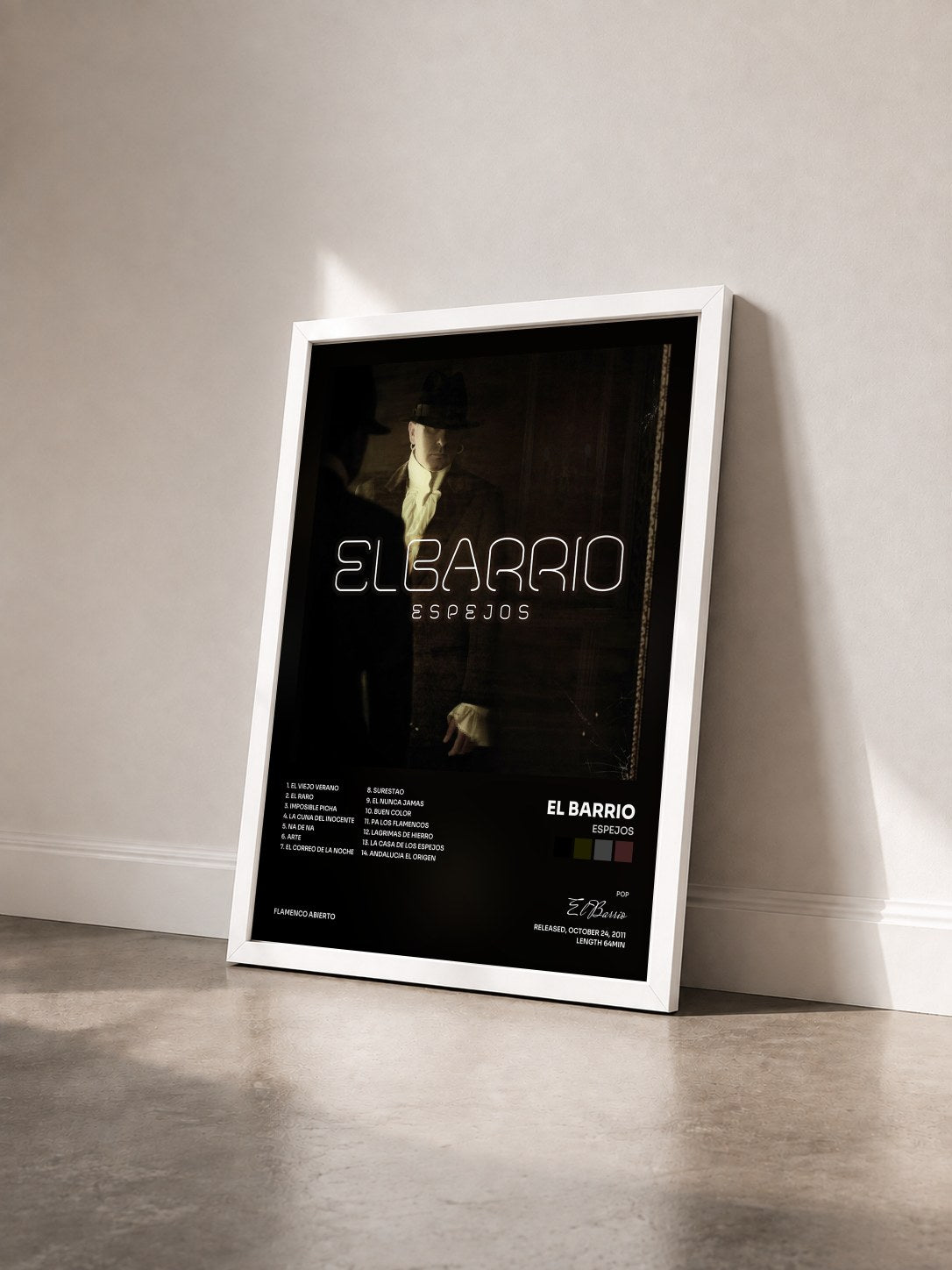 #blanc Tableau de l'album Espejos de El Barrio vu de trois quarts, cadre blanc